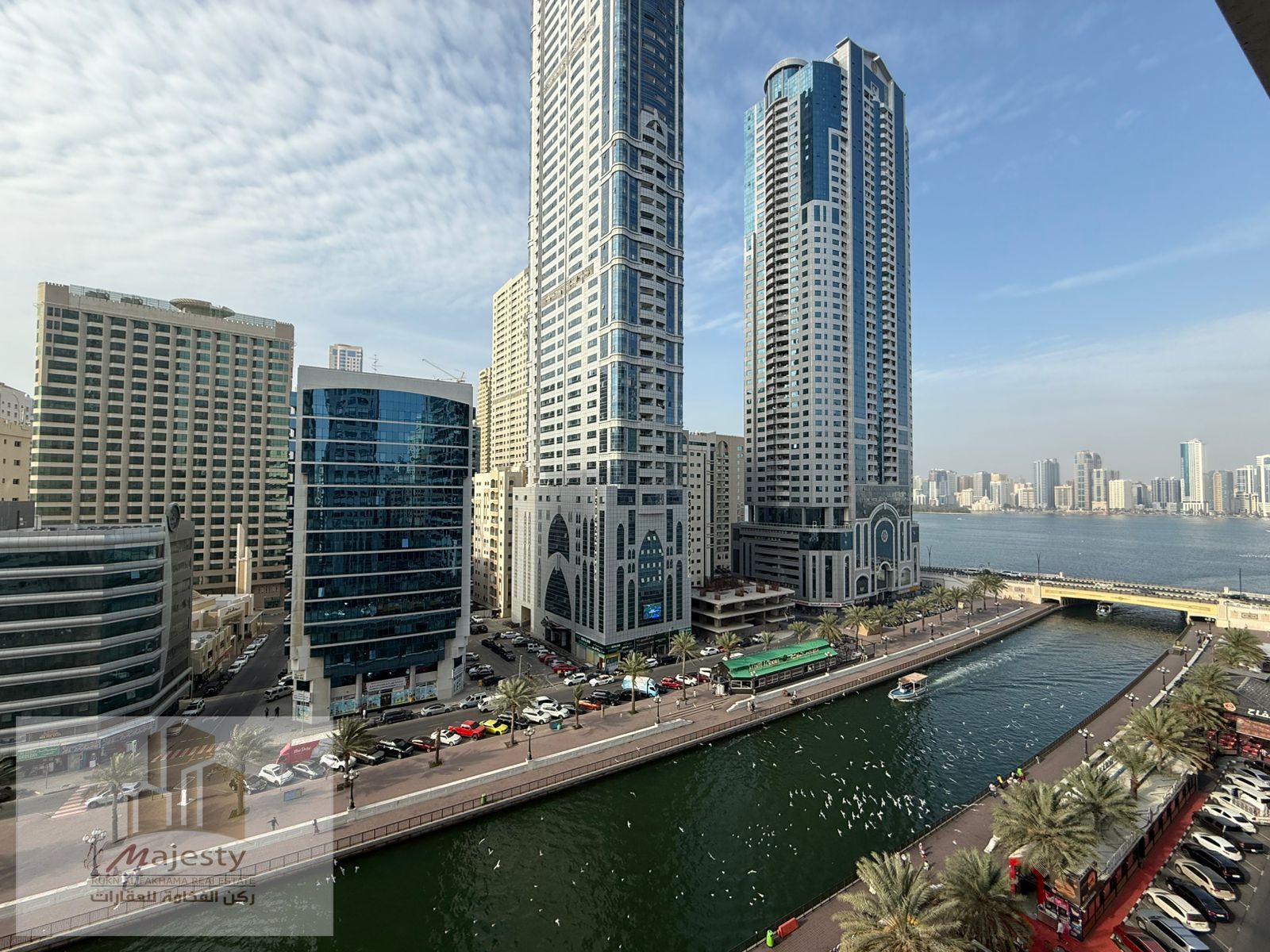 Luxury apartment for rent in Al Majaz 3 with a front view of Al Qasba Canal, spacious balconies, a sophisticated family-friendly location, and close t