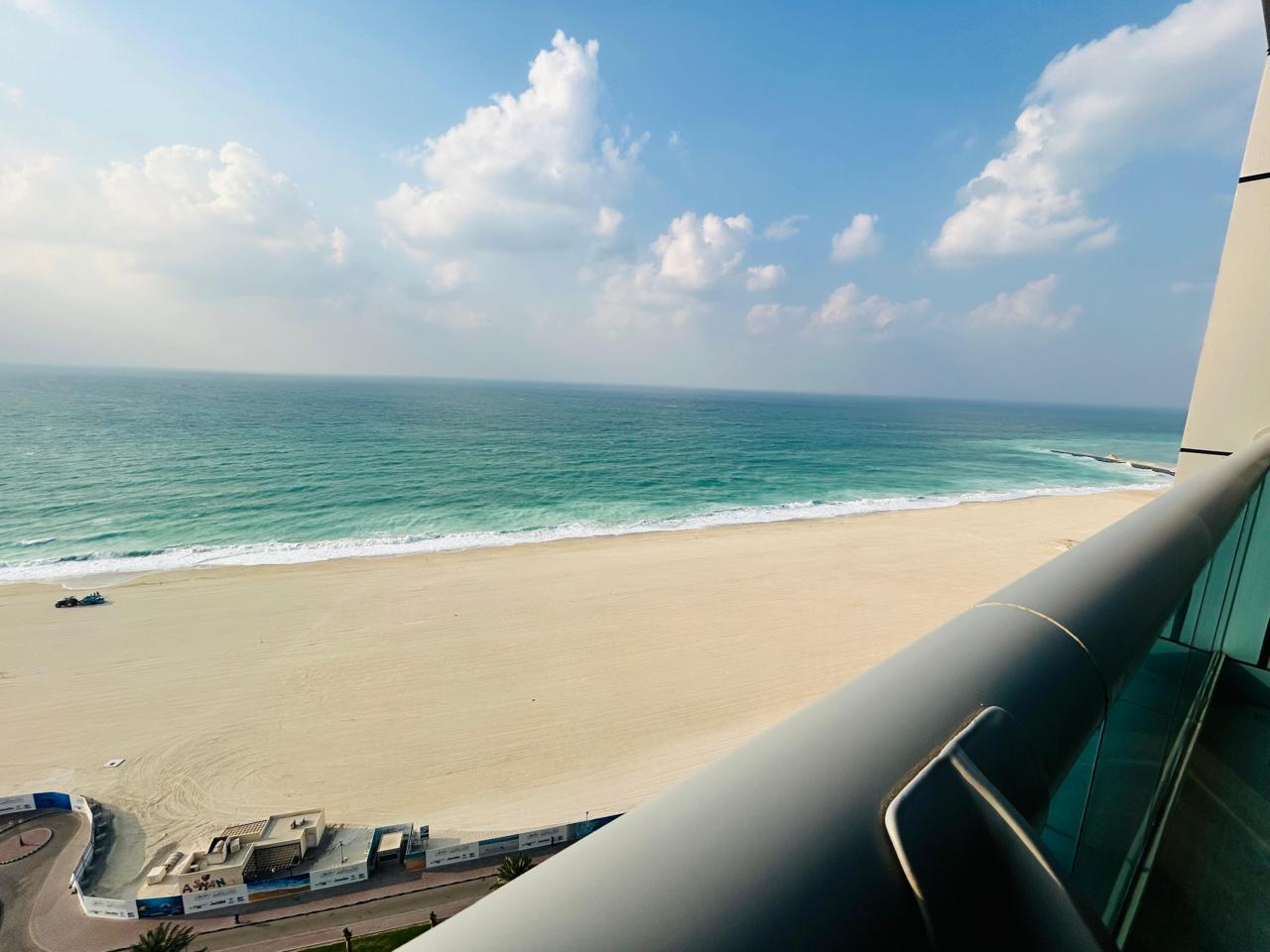 SEA VIEW 5 Star | 2 BHK ON MONTHLY RENTALS | BEACH ACCESS | KFC, HARDEES IN BUILDING | 30 MINS TO DUBAI | GYM | POOL | SAUNA | JACUZZI | STEAM ROOM