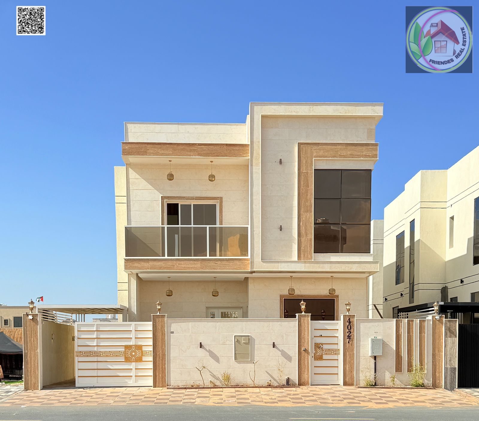 Luxury two-story villa for sale in Ajman, modern design and prime location, at an attractive price including electricity and water, freehold ownership
