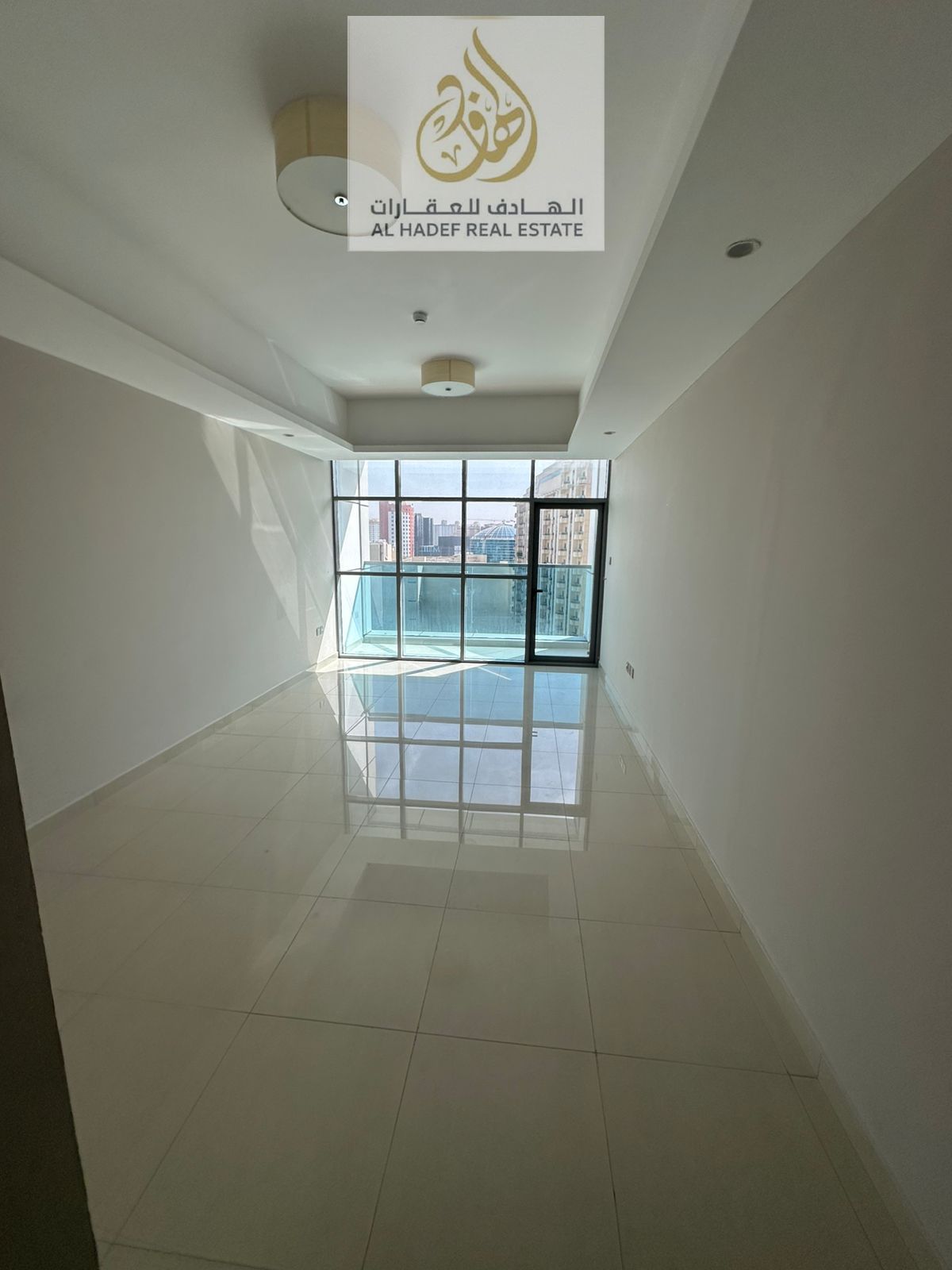 One bedroom and living room with two bathrooms, first occupancy, with built-in wardrobes, open view, very large area, free parking, gym, swimming pool