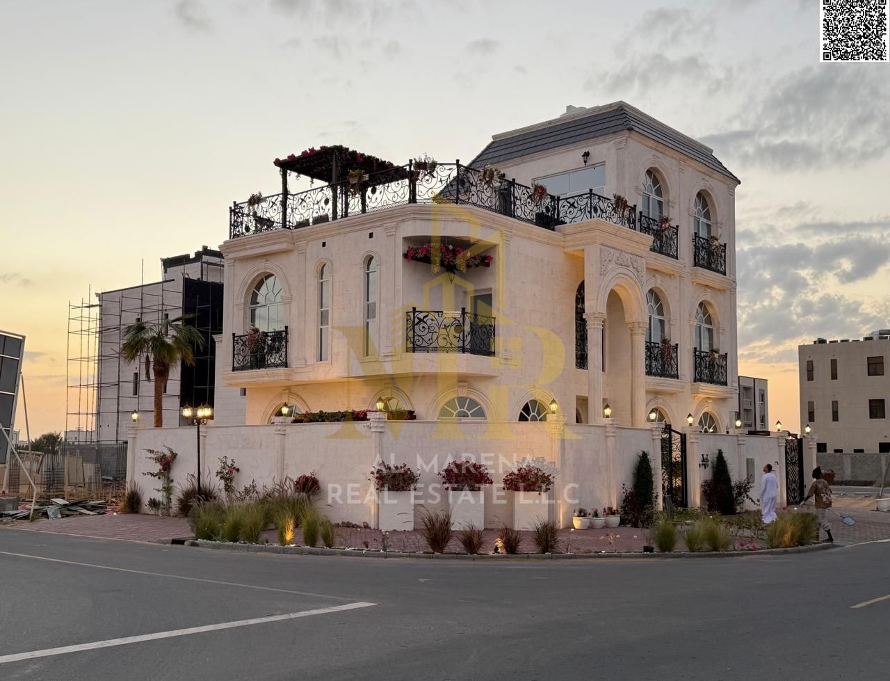 In Al Bahia area, Ajman, a corner villa with two floors and a roof, including a swimming pool and air conditioning. Freehold ownership for all nationa