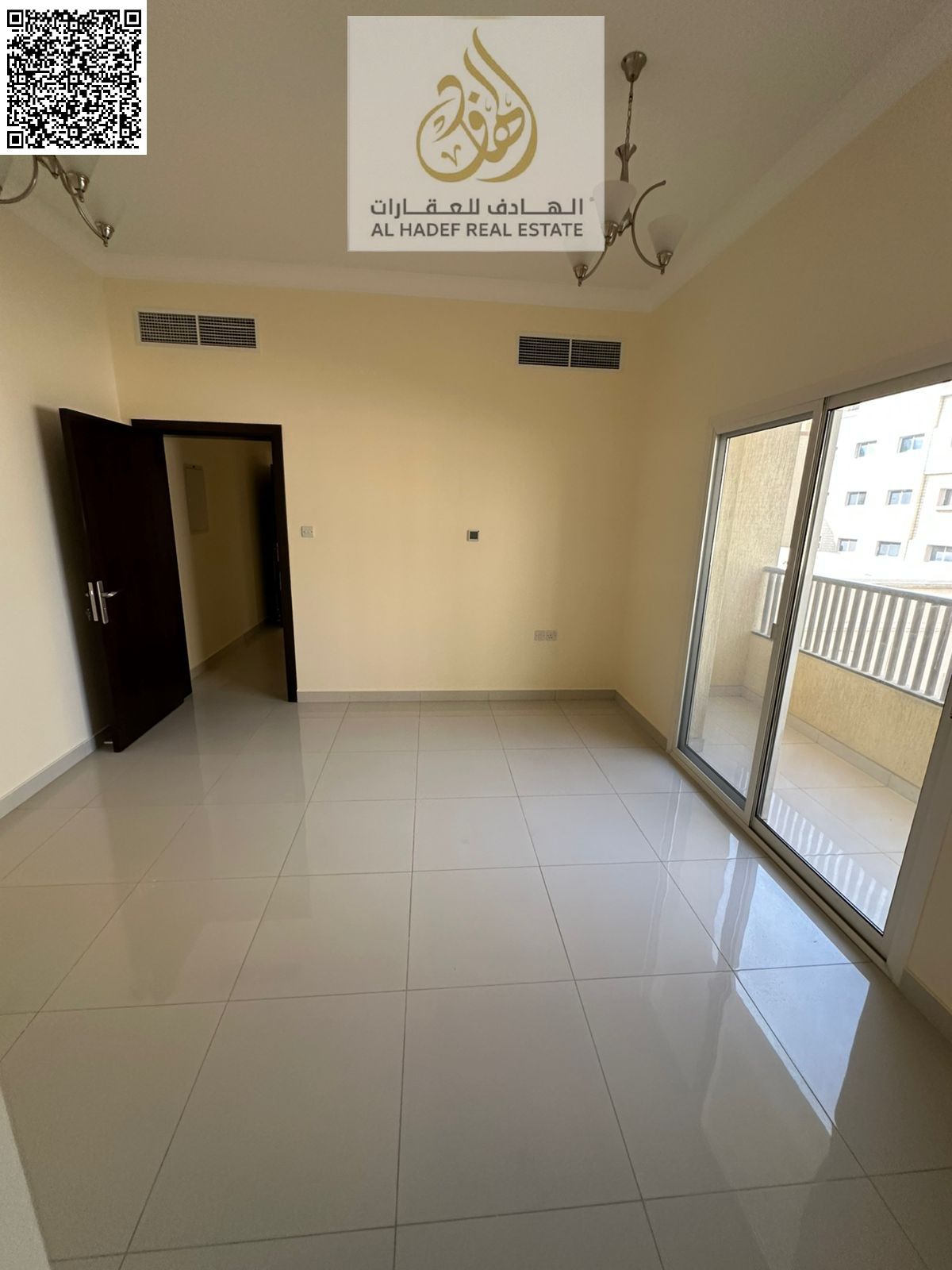 A detached one-bedroom apartment with a living room, two bathrooms, and a balcony. First occupancy, at the lowest prices. Spacious layout in Al Rawda