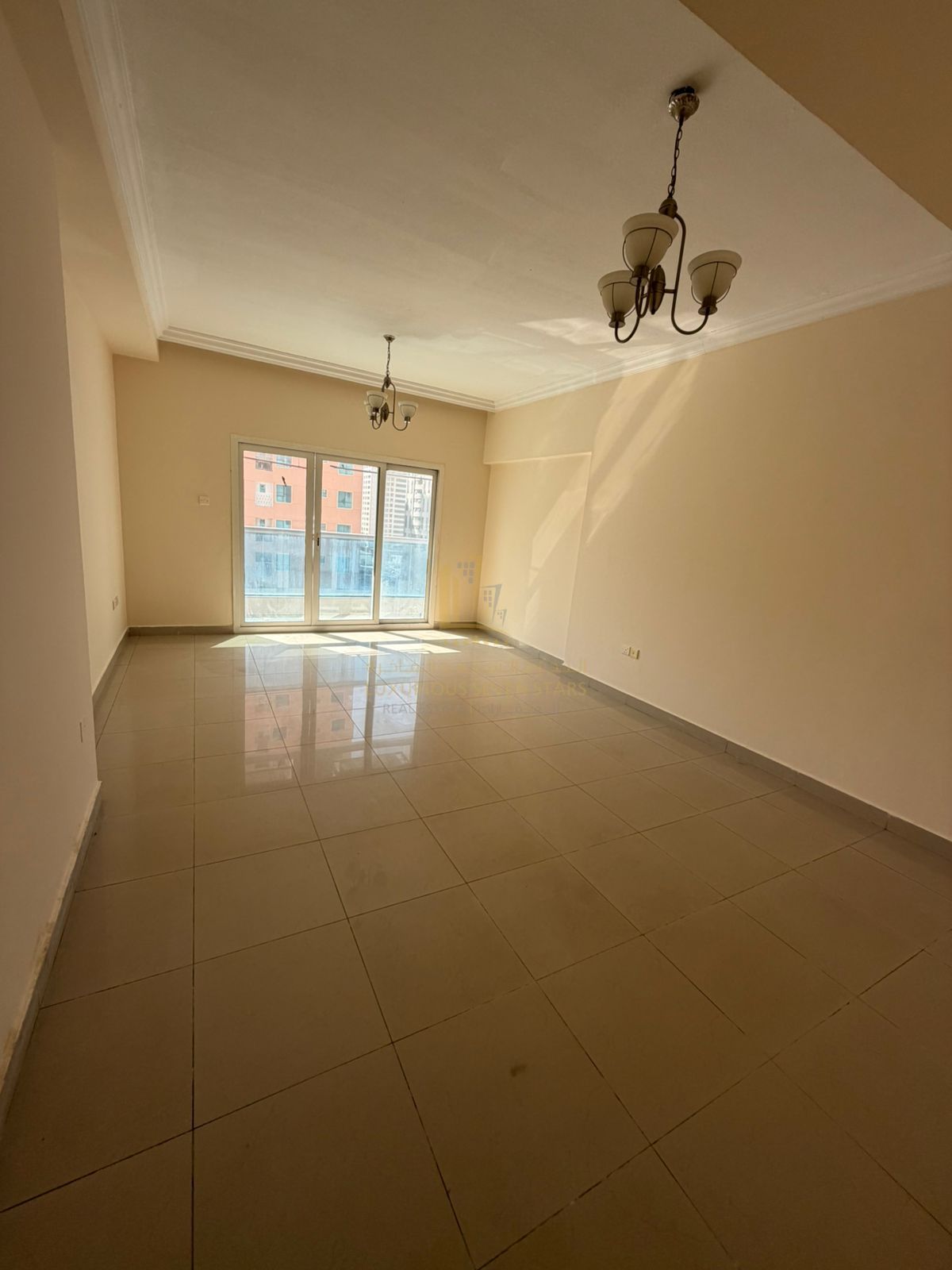 Two-Bedroom Apartment for Sale in Manazel Tower 3 – Prime Location on Al Ittihad Road
