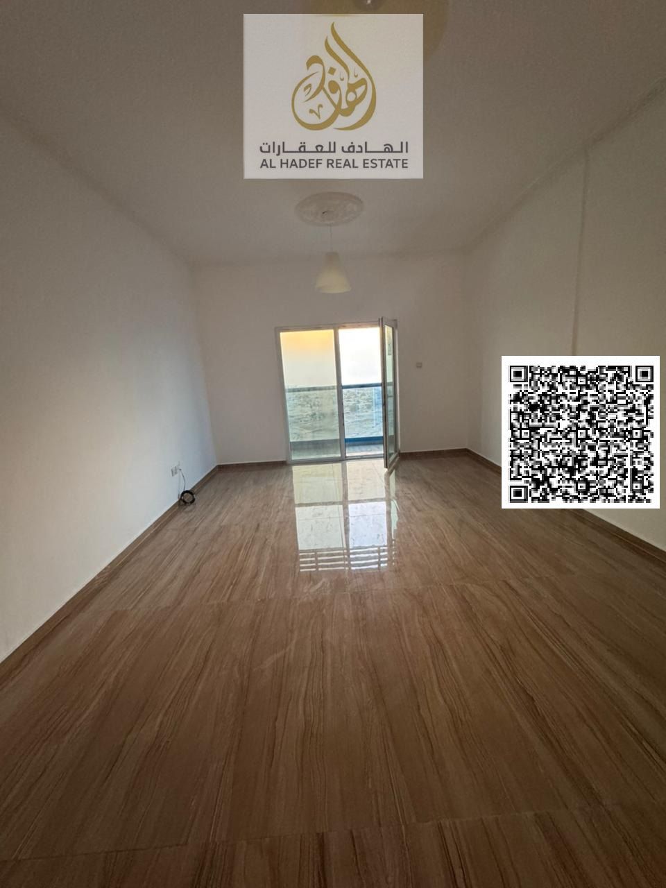 One-bedroom apartment for rent in Al Nuaimiya 3, behind Dubai Islamic Bank, near the Corniche. Features include a balcony with an open view, two maste