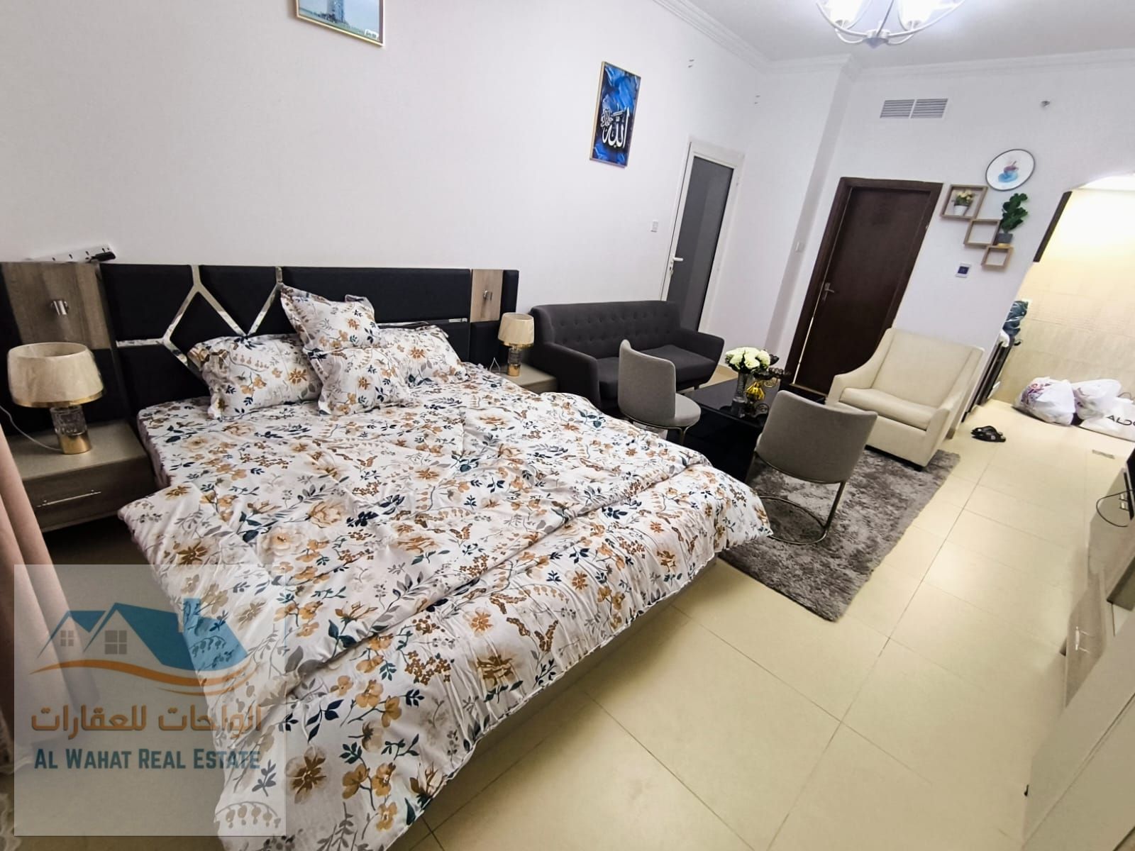 Studio apartment for monthly rent with a separate kitchen and a large balcony with an open view in Al Yasmin Towers, next to City Centre Ajman, very c