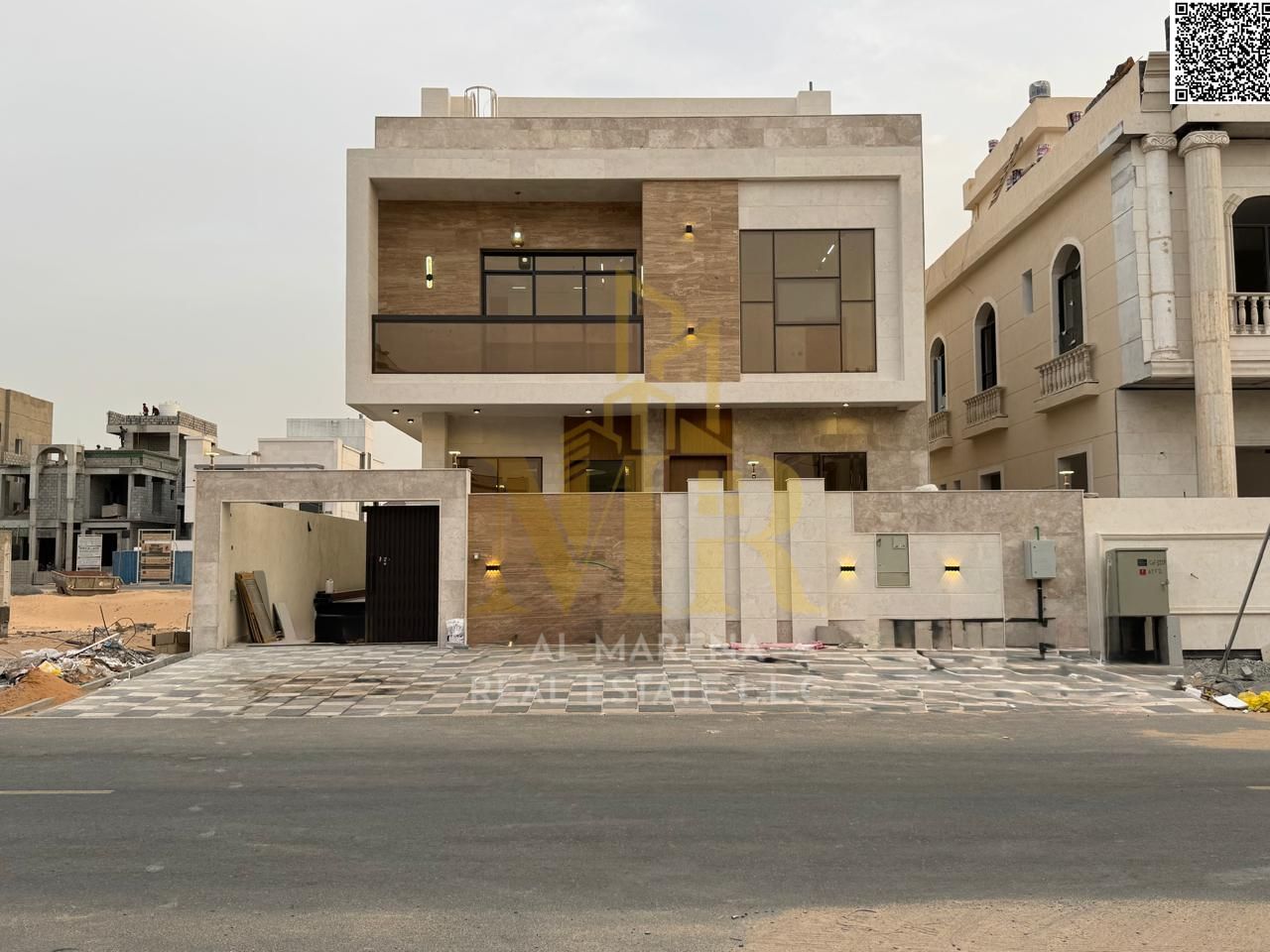 Villa for sale in a prime location opposite services and Sheikh Mohammed Bin Zayed Road, price includes registration and ownership fees.