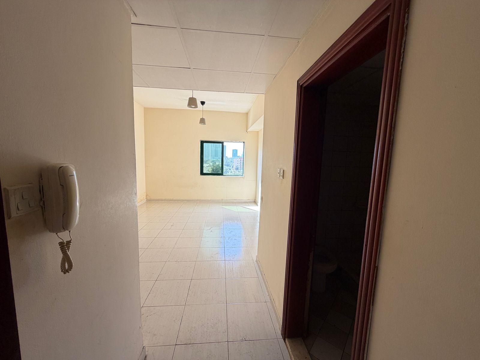 A distinctive studio apartment with excellent space, located in a prime area of Al Rashidiya, at a reasonable price for families.