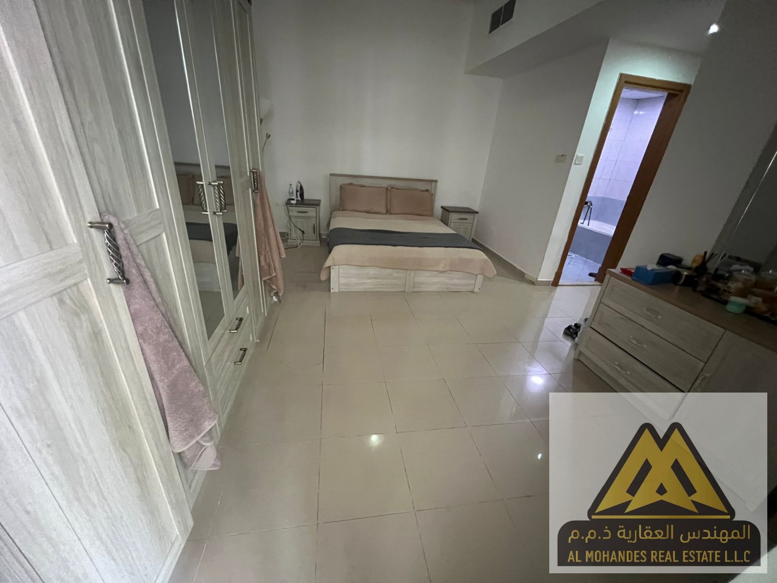 Master bedroom, large living room, separate kitchen, balcony