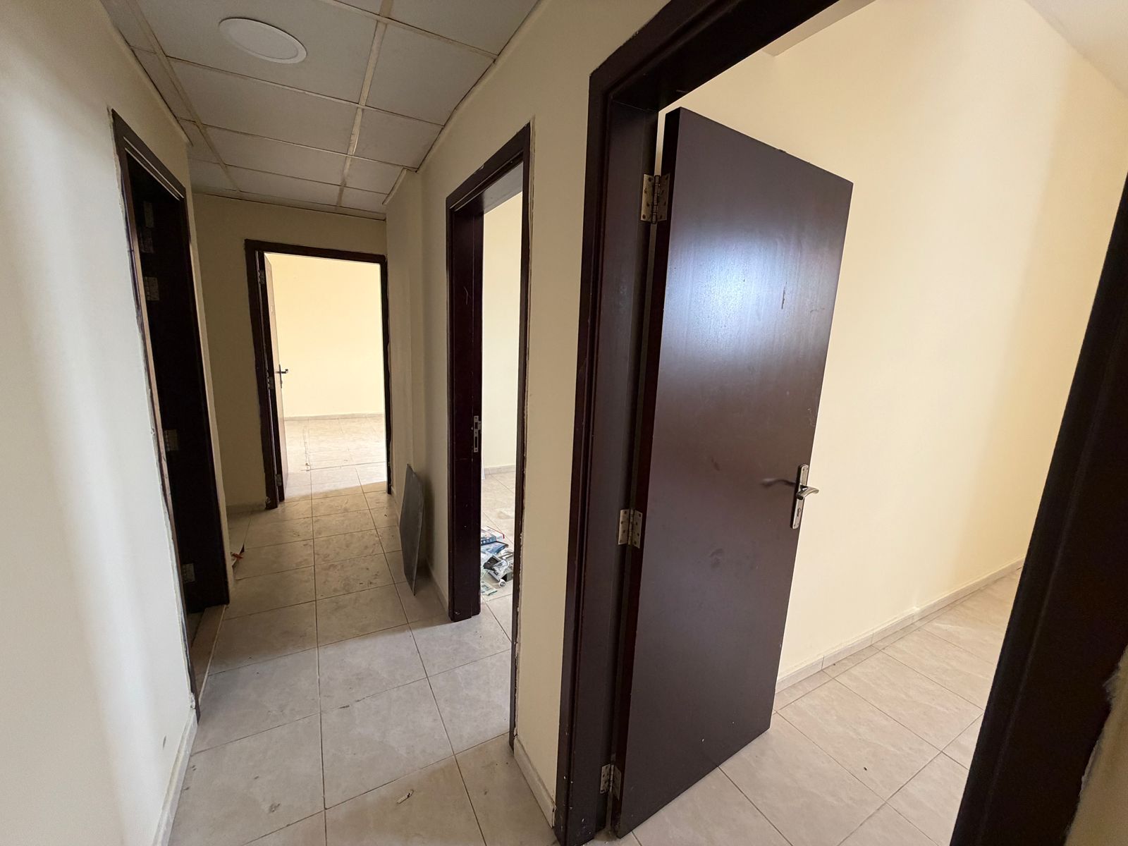 Two-bedroom apartment with a living room for annual rent in Ajman, Al Rawda, near Sheikh Ammar Street. Balcony with an open view. Clean finishing. A