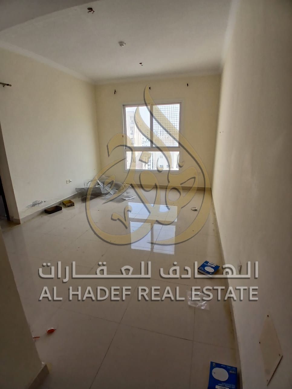 Available: 2-bedroom apartment with a spacious living room, , located in a prime area of Abu Shagara close to Nesto and all essential services and pub