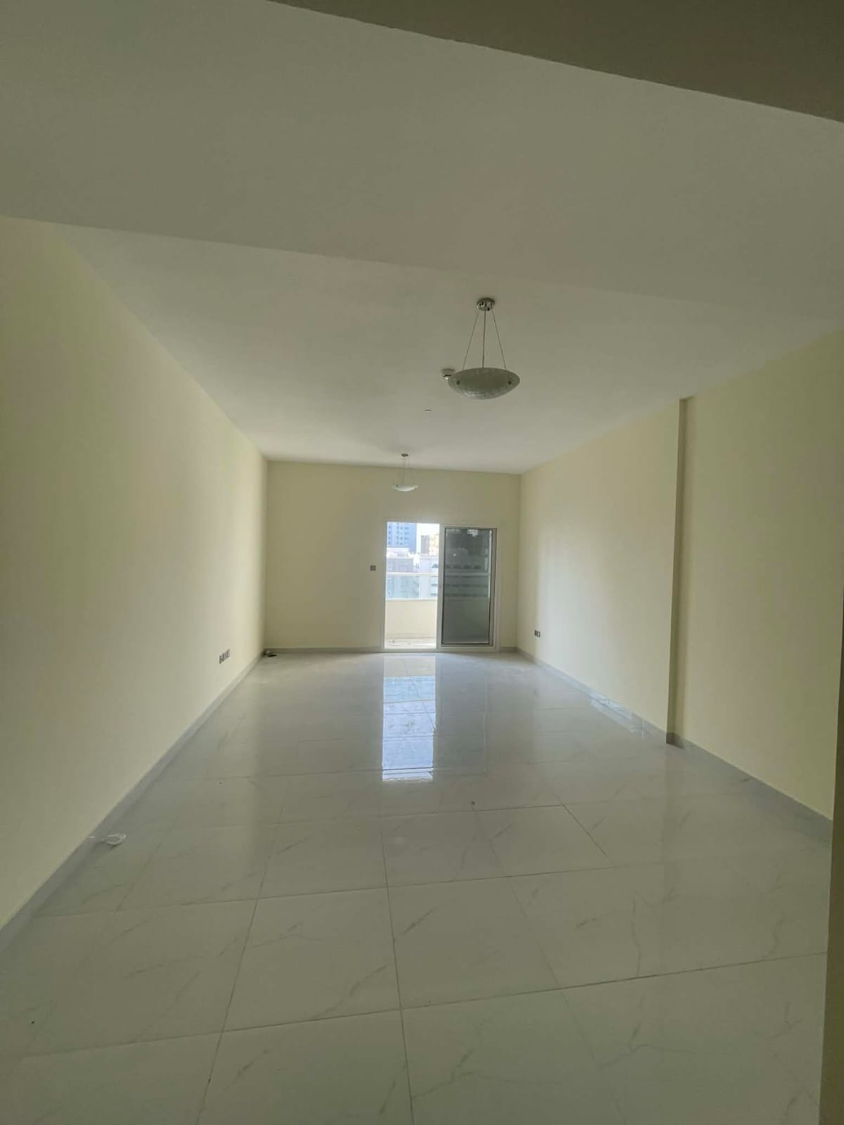 Second-tenant 2BR apartment in Al Qasimia, 3 bathrooms, balcony, 1 month free, free parking, near bus station, central AC.