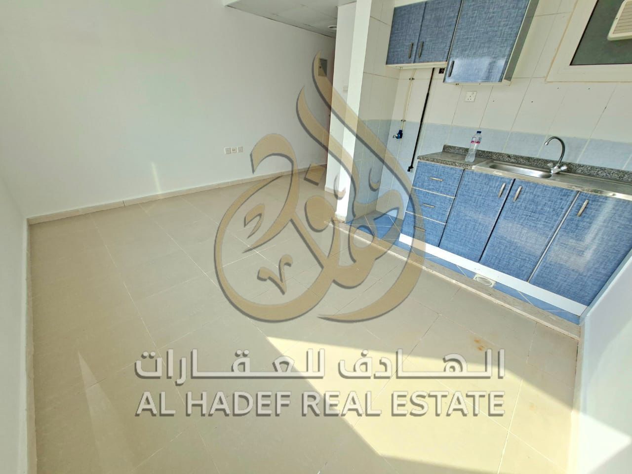 Studio for annual rent in the Taawun area near Dubai Exit, prime location next to all services with easy payment in 4 installments. Security deposit b