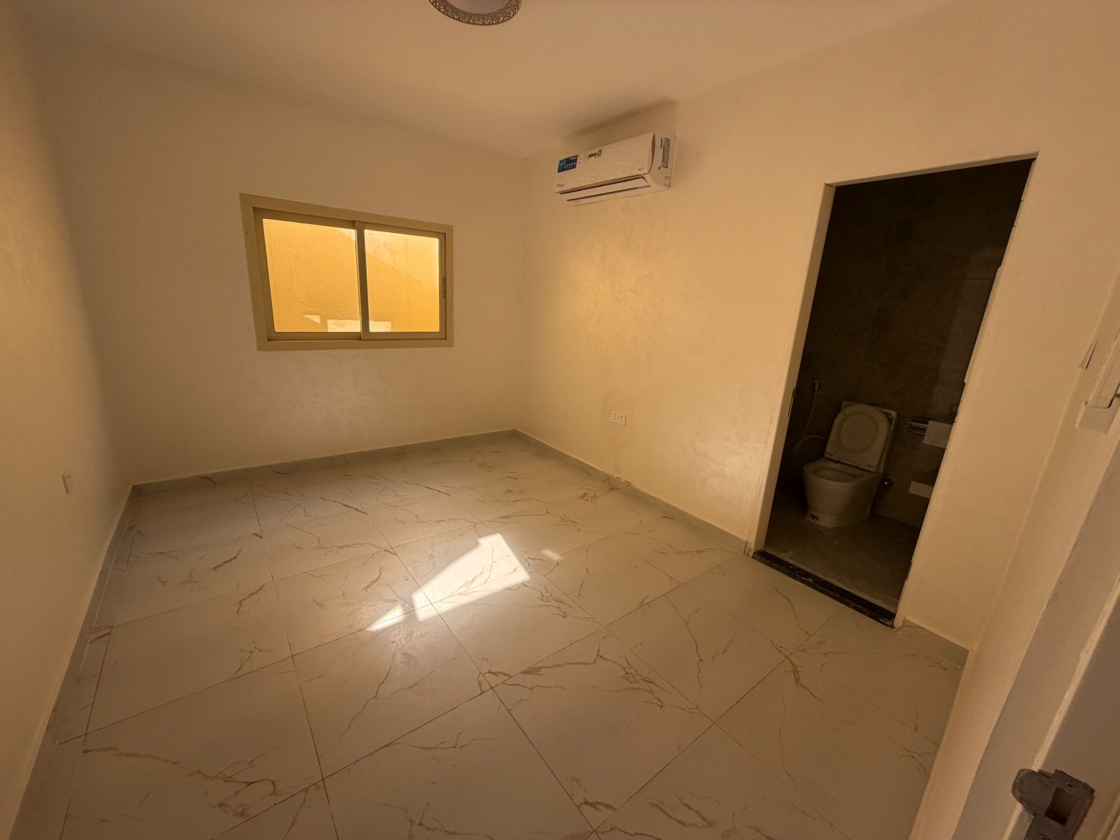 A distinctive villa annex is available for annual rent in Al Muwaihat 2, Ajman. Located in a prime, quiet area, it's ideal for families seeking privac
