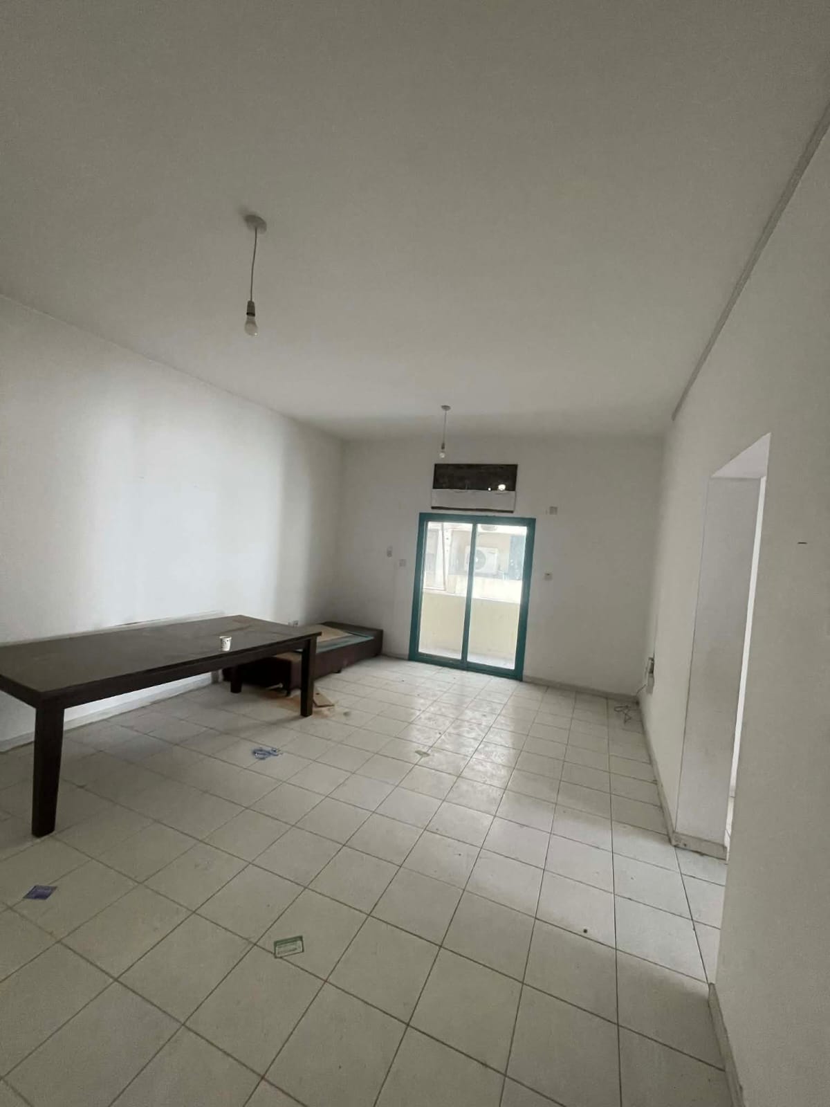 2BR apartment in Al Qasimia (Station area), near Al Jubail bus station, 1 bathroom, balcony, built-in wardrobes, spacious layout.