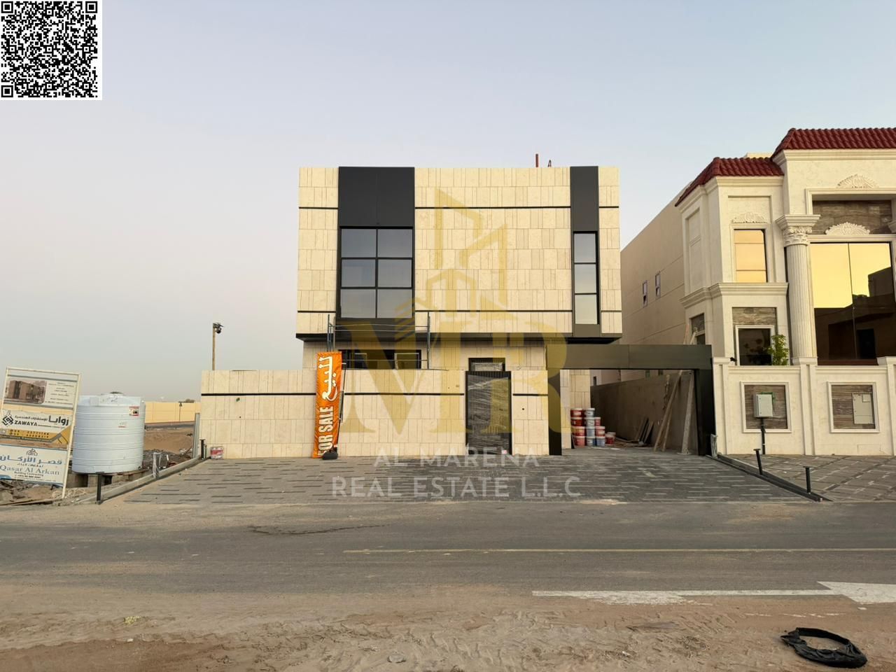 Two-story villa with a rooftop terrace for sale in a prime location opposite services and Sheikh Mohammed Bin Zayed Road. Registration and ownership f