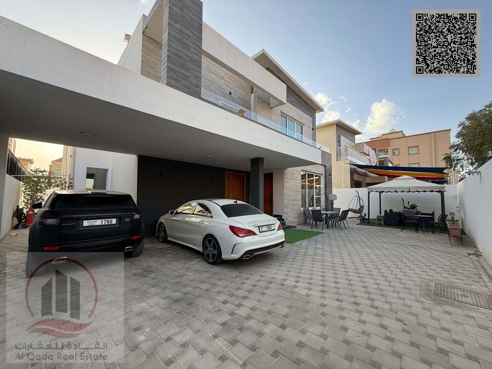 Villa for sale in Ajman Al Rawda, featuring 5 master bedrooms, a majlis (formal sitting room), a living room, and a maid's room. Freehold ownership av