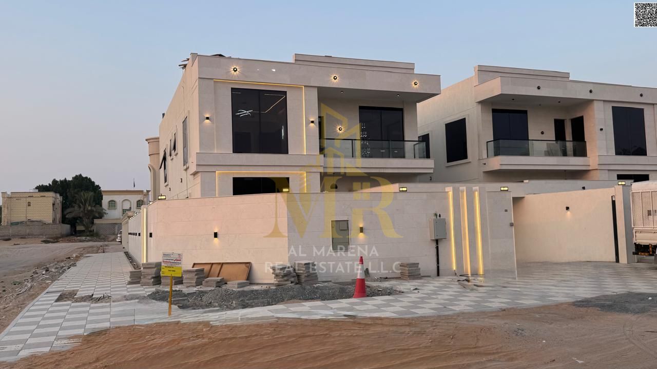 Luxury villa in Al Rawda 2, Ajman, ready for immediate occupancy with high-end finishes and spacious living areas. Price includes central air conditio