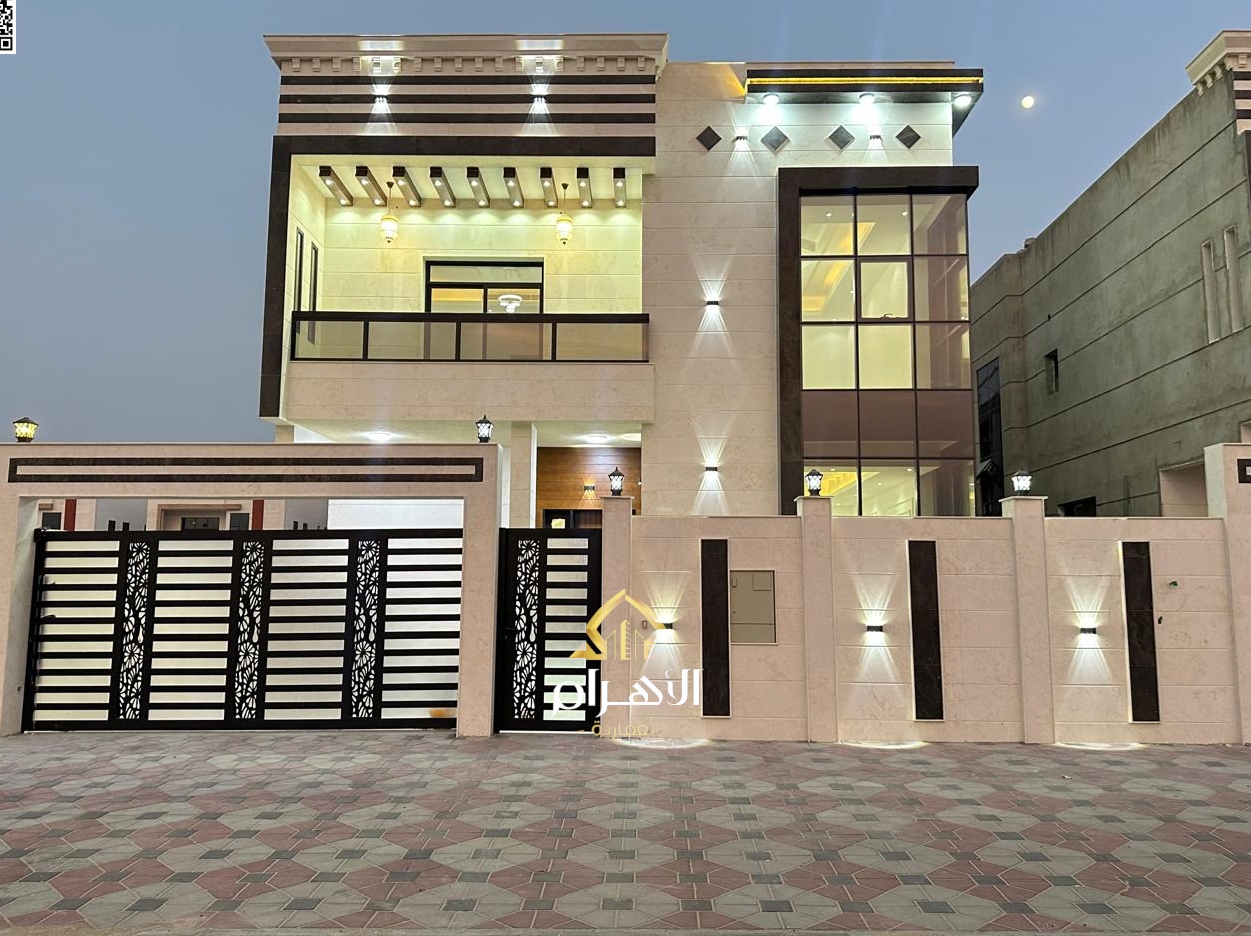 Luxury villa for sale in Al Bahia area, featuring two floors and a rooftop terrace. Modern design, spacious living areas, reception halls, and compreh