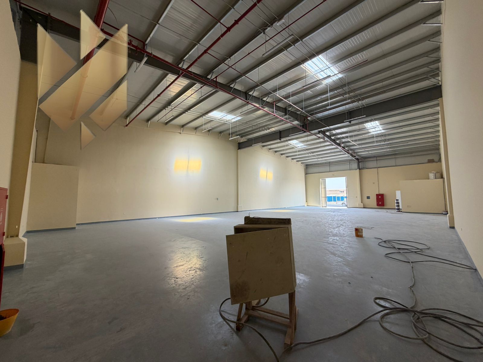 Warehouse for rent in Al Suja’a | Prime strategic location | Main road | Spacious area | 500 kW electricity | Office for business operations | Payment