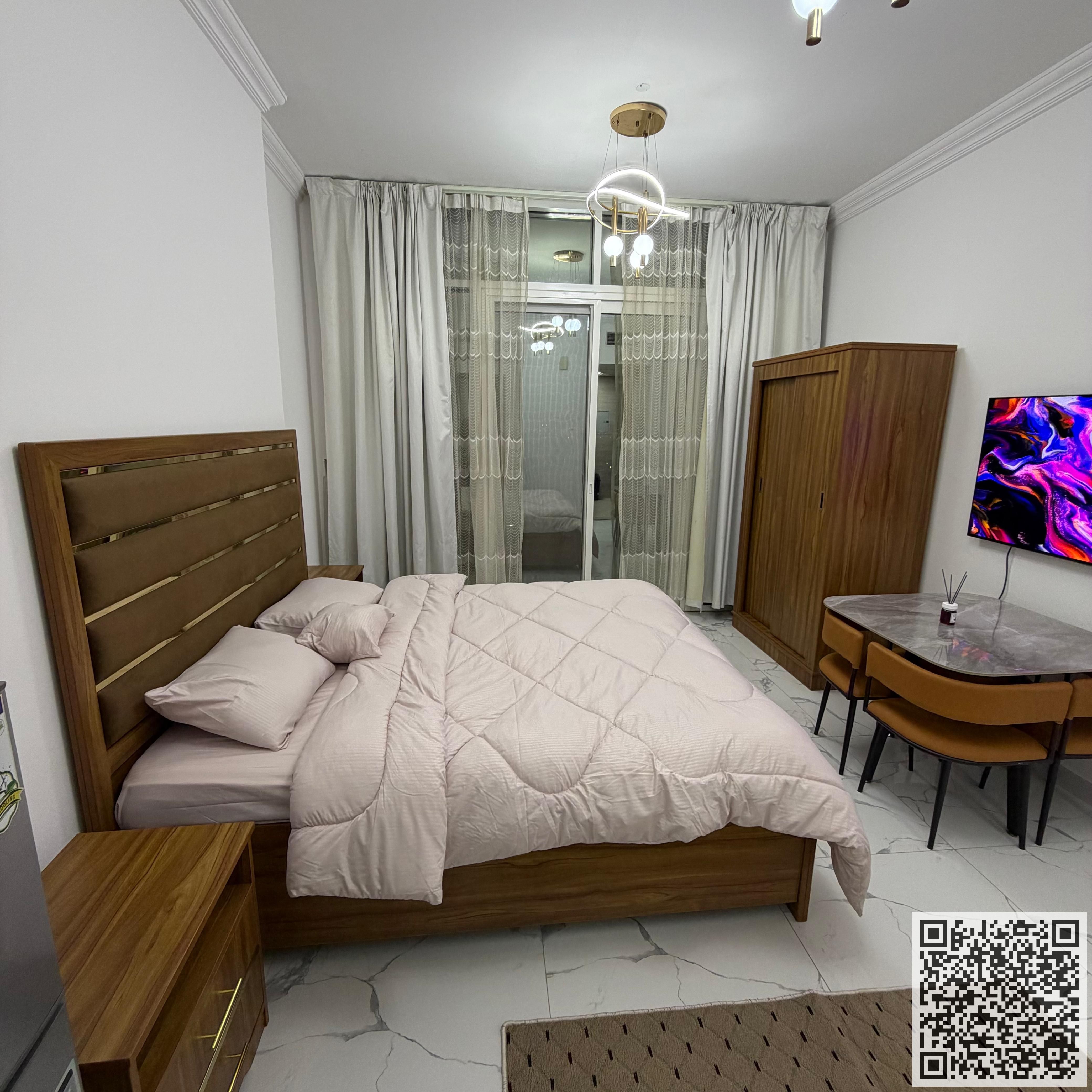 Fully furnished studio apartment with balcony for monthly rent in Ajman, Al Rashidiya area Includes bills and internet, gym, swimming pool, parking