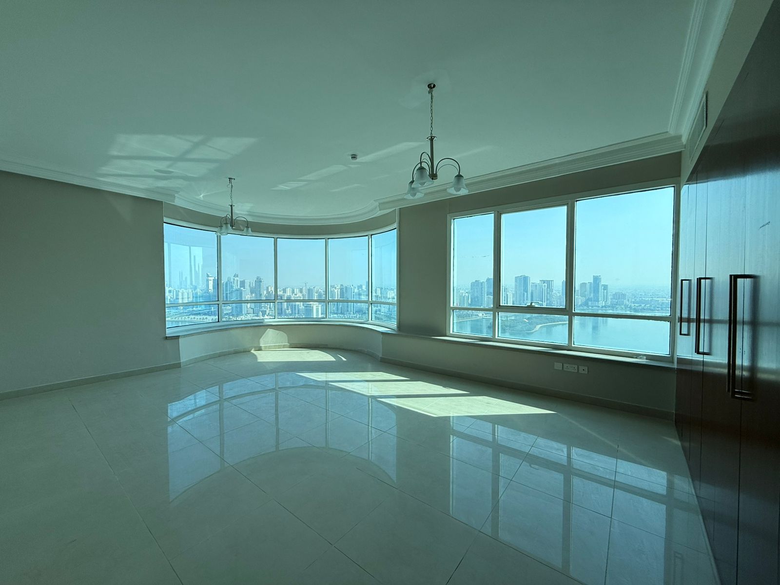 Sea view, one month free, prime and lively location close to all services like cafes and shops, and near Dubai exit.