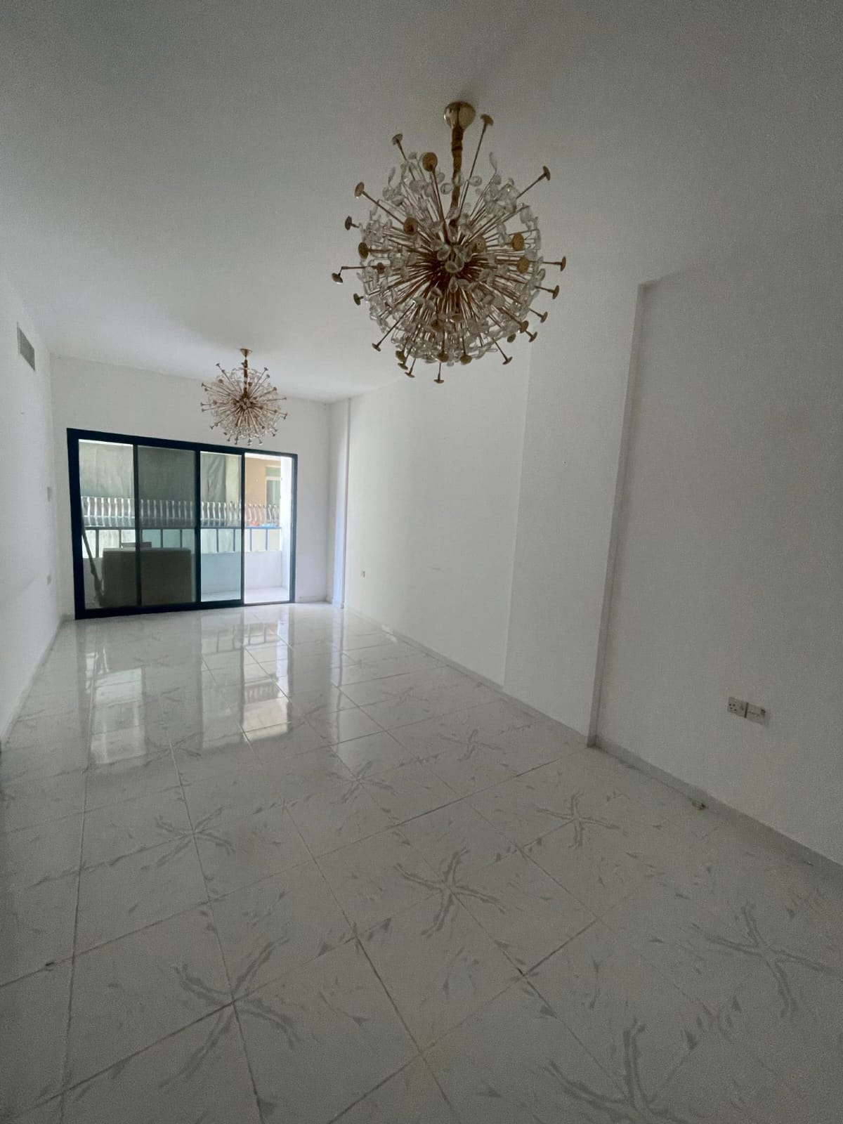 Premium 2BR apartment in Al Majaz 3, Sharjah, balcony, built-in wardrobes, central AC, elegant finishing, prime location.
