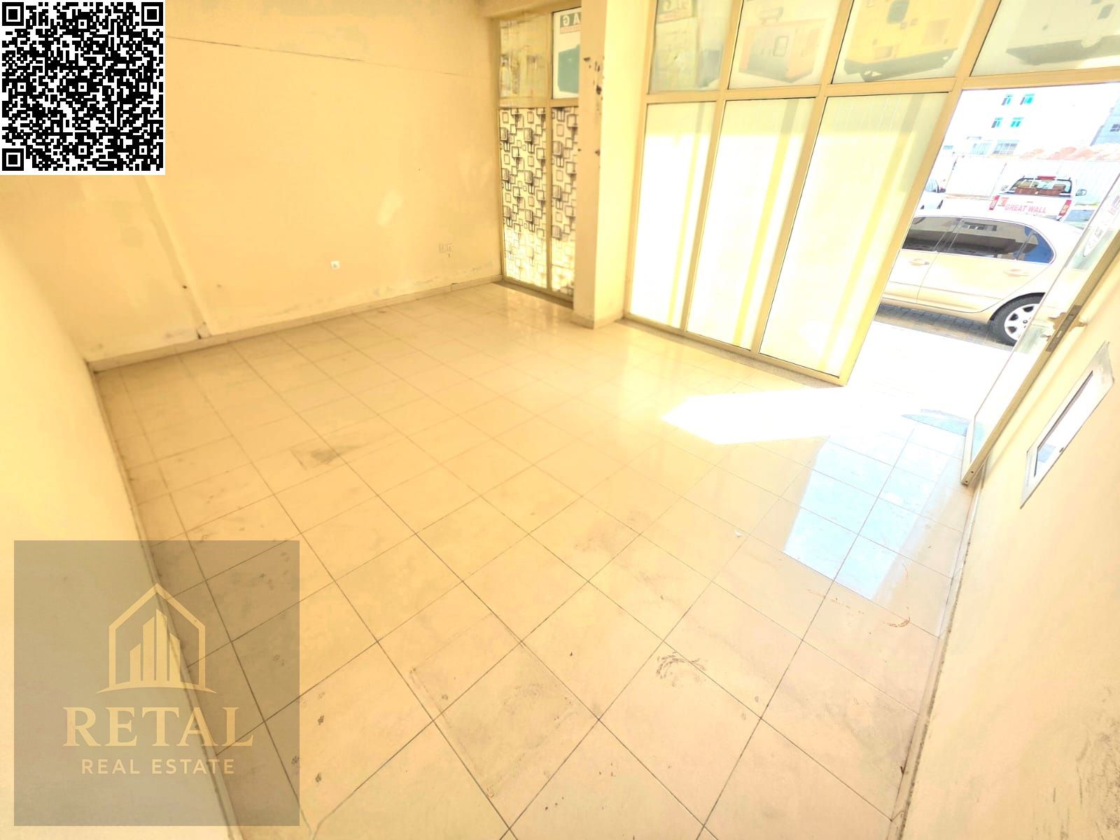 Large shop on an asphalt street, close to the main street, excellent rent.