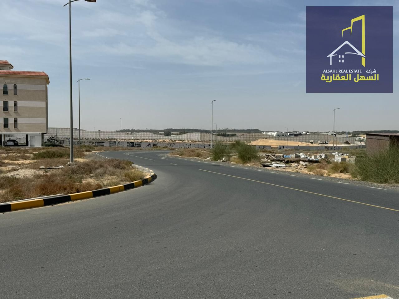 Residential/commercial land for sale in Tilal/Al Suyoh suburb.