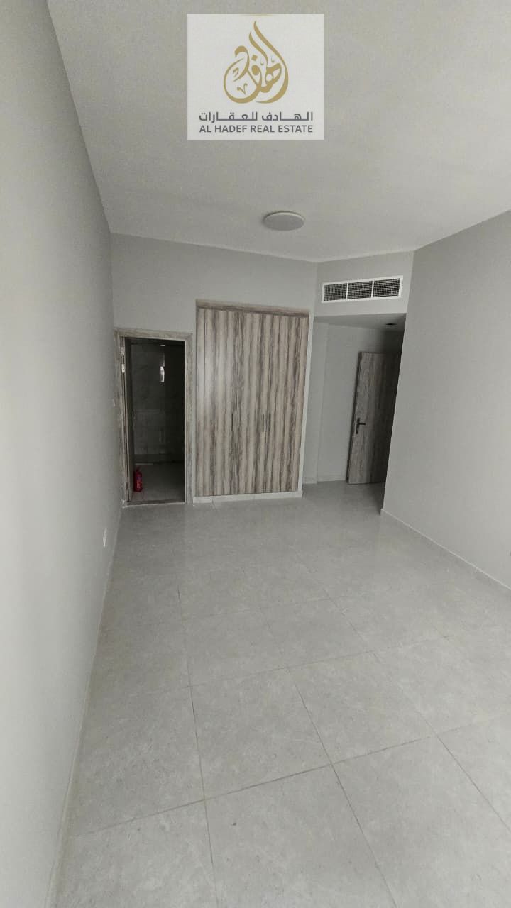 One bedroom, living room, and two bathrooms. First occupancy. Includes built-in wardrobes, a separate living room, central air conditioning, spacious