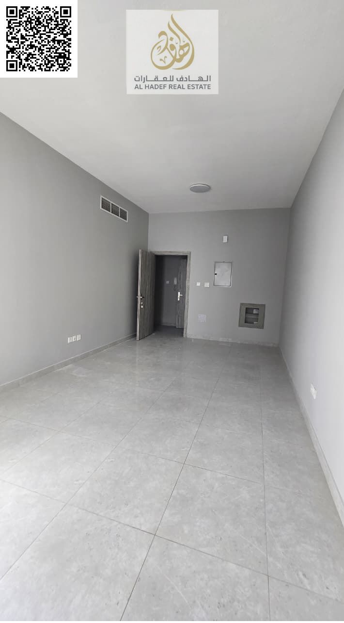A well-maintained apartment available for annual rent in a lively and strategic location in Al Jurf 3, directly on the main road and very close to Chi