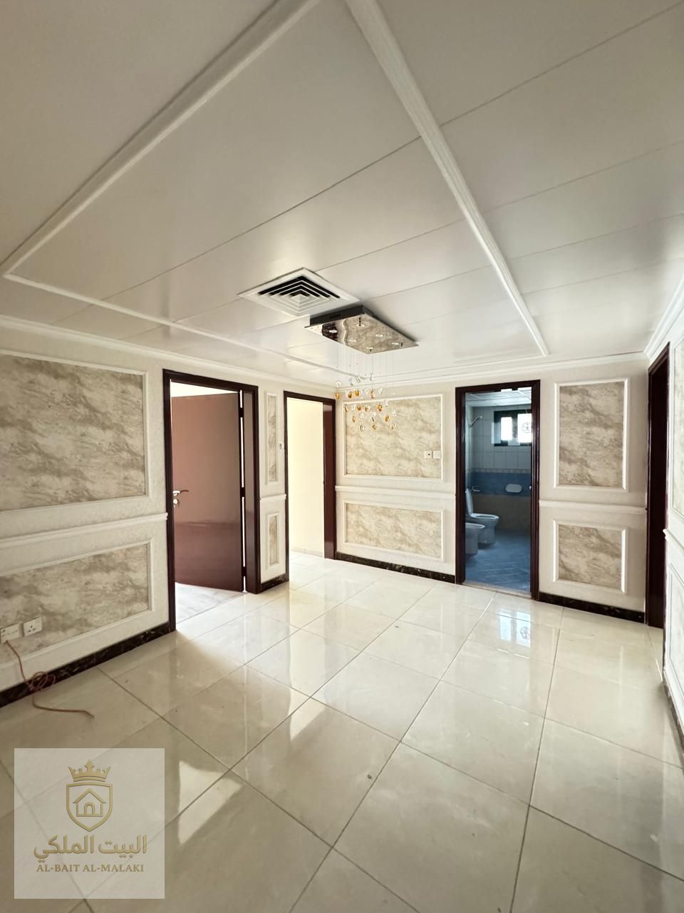 Three bedrooms and a living room in Al Qasba with a small maid's room. Payment in four or six installments. Security deposit: undated check (not paya