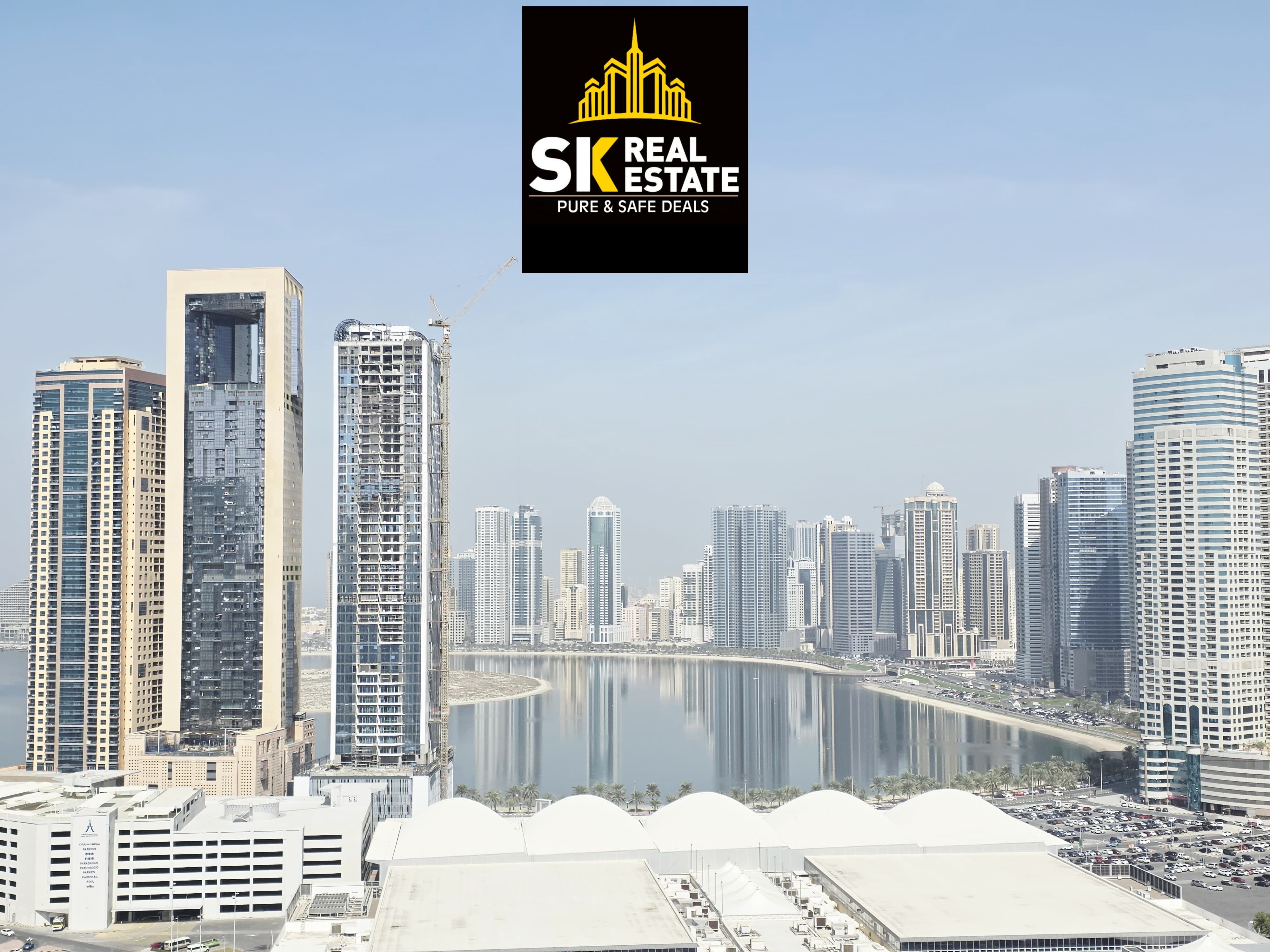 BRIGHT 1BHK APARTMENT+GYM -SWIMMING POOL FREE WITH SEA VIEW EASY EXIT TO DUBAI