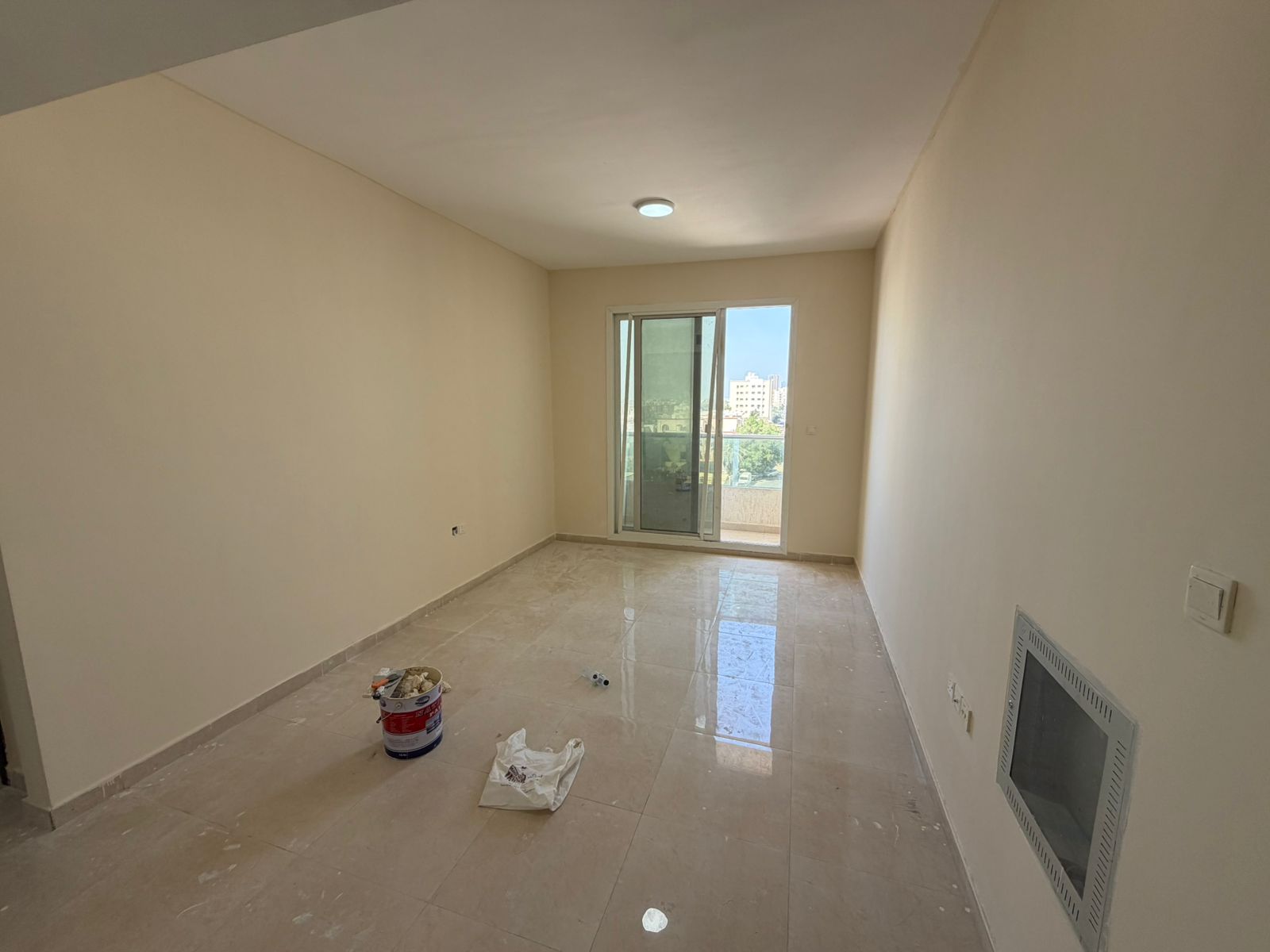 New apartment, second tenant, for annual rent in Al Nuaimiya, Ajman. Prime location near Al Hikma School, within a prestigious building and an elegant