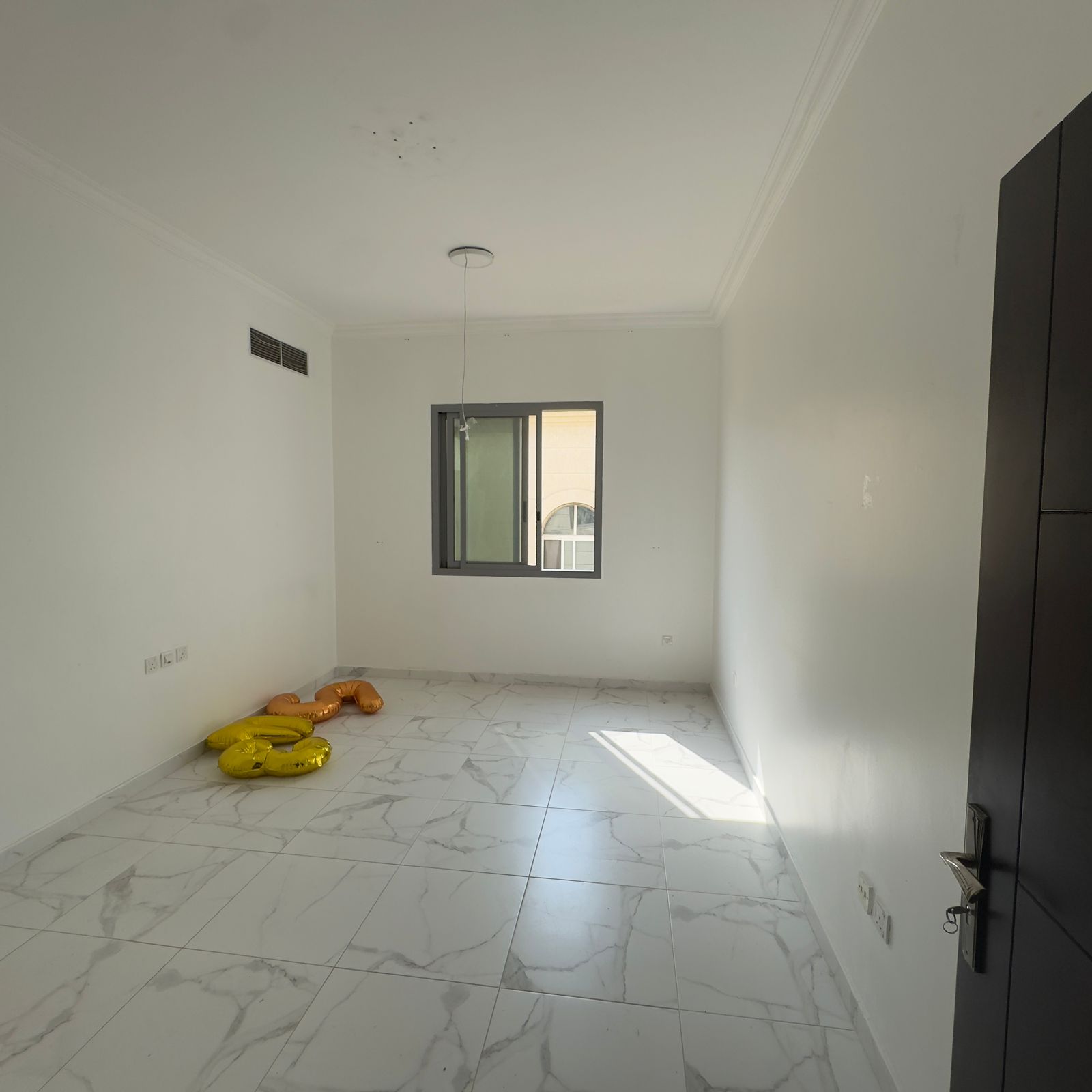 A great deal on a one-bedroom apartment for annual rent in Ajman - Al Rawda. Prime location near Al Hamidiya Police Station. Suitable for families a