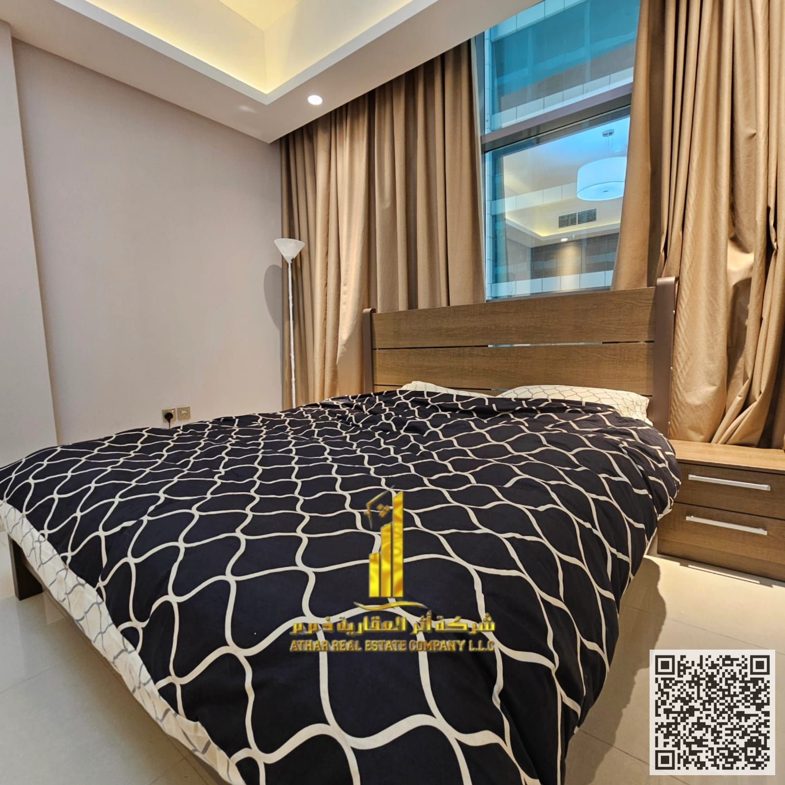Luxurious and elegant fully furnished one-bedroom apartment with brand new, high-end furnishings in a prime location with a gym, swimming pool, and pr