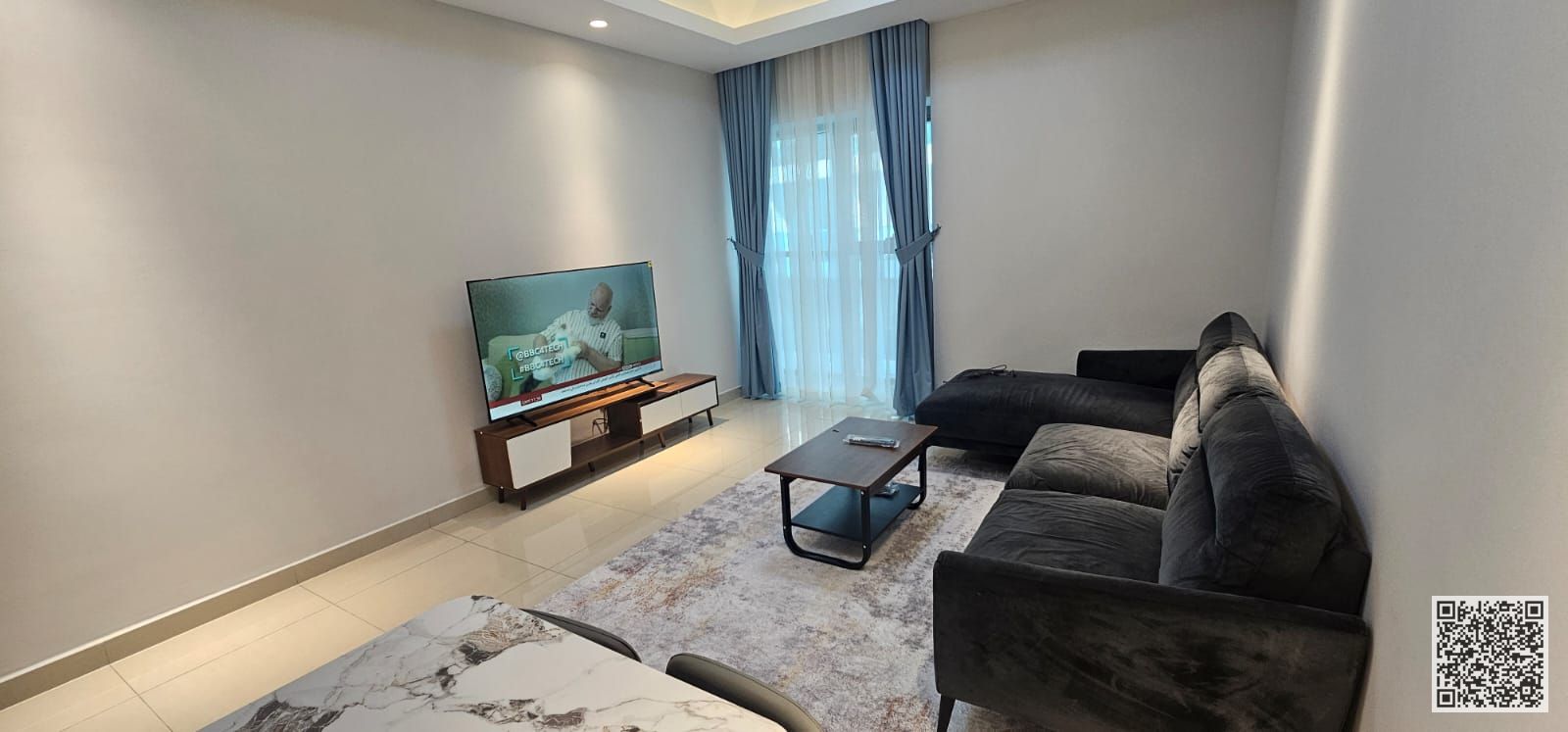 The most luxurious and elegant one-bedroom apartment, fully furnished with brand new, high-end furniture, with a gym, swimming pool, and private parki