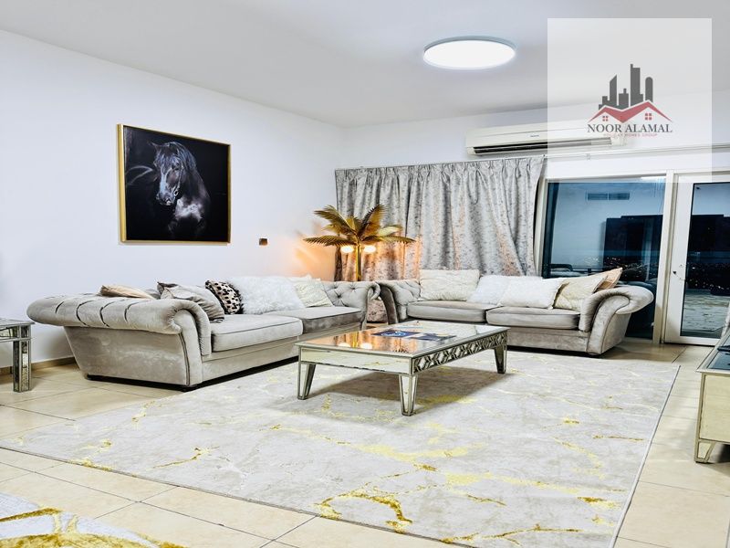 Sharjah Al Khan Furnished apartment with hotel furnishings, three rooms, a living room, a kitchen, three bathrooms, and a balcony with an open view