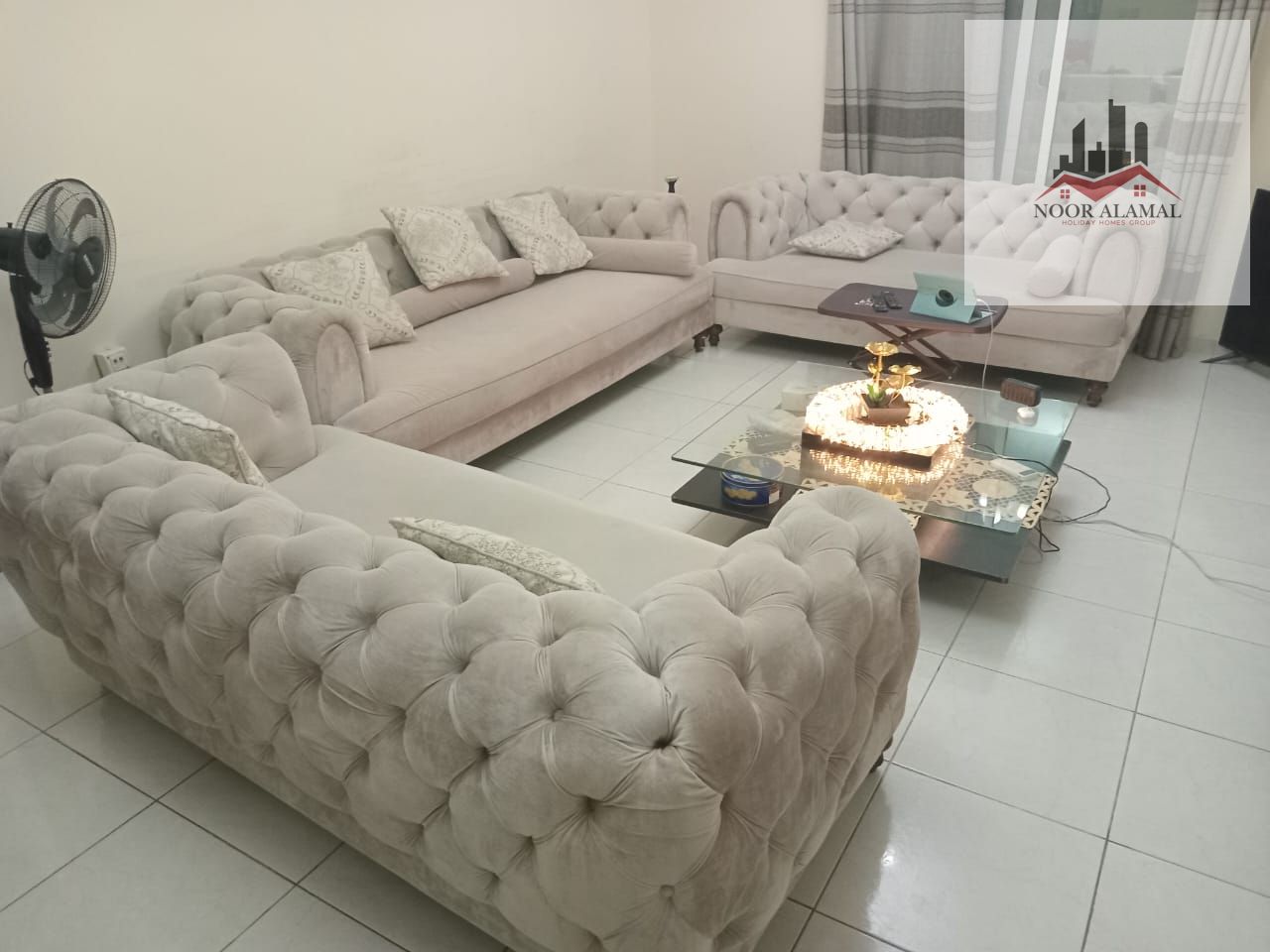 Sharjah, Al Taawun area: One bedroom, living room, kitchen, two bathrooms, and a balcony on the main street