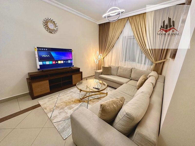 Sharjah, Al Taawun area: three bedrooms, living room, kitchen, three bathrooms, and balcony. Price: 8500 AED including internet and parking.