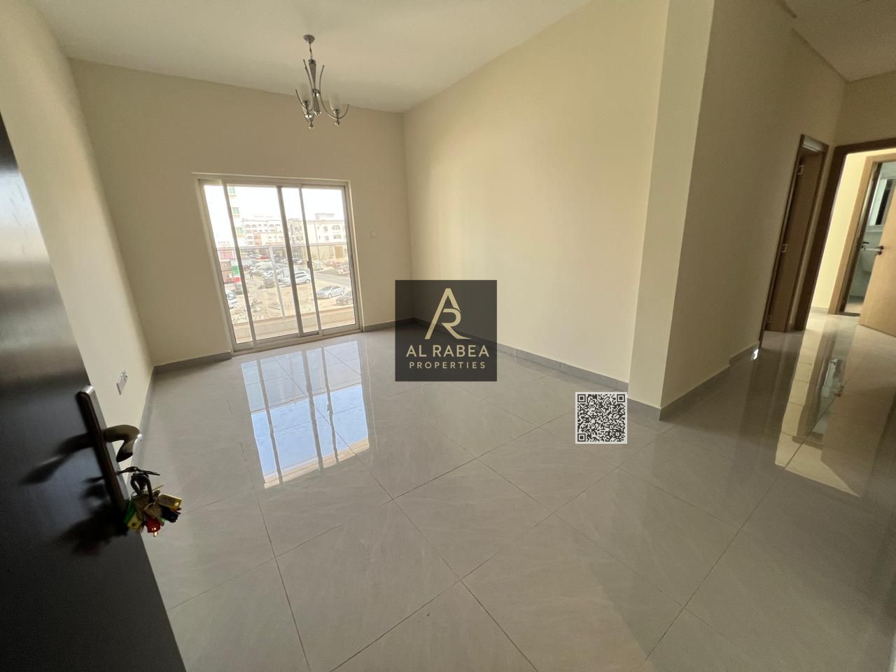 Apartment for rent in Al Rawda - Location: Al Rawda 2, opposite Kenz Hypermarket - Details: - Two bedrooms and a living room - Three bathrooms - Bal