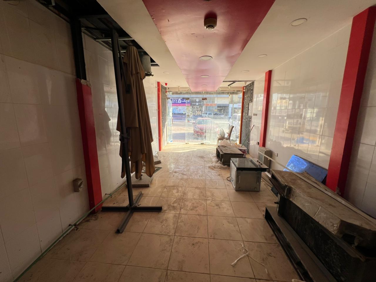 A prime shop for annual rent on Sheikh Ammar Main Street in Ajman, in a vibrant and visible location, suitable for all commercial activities such as o