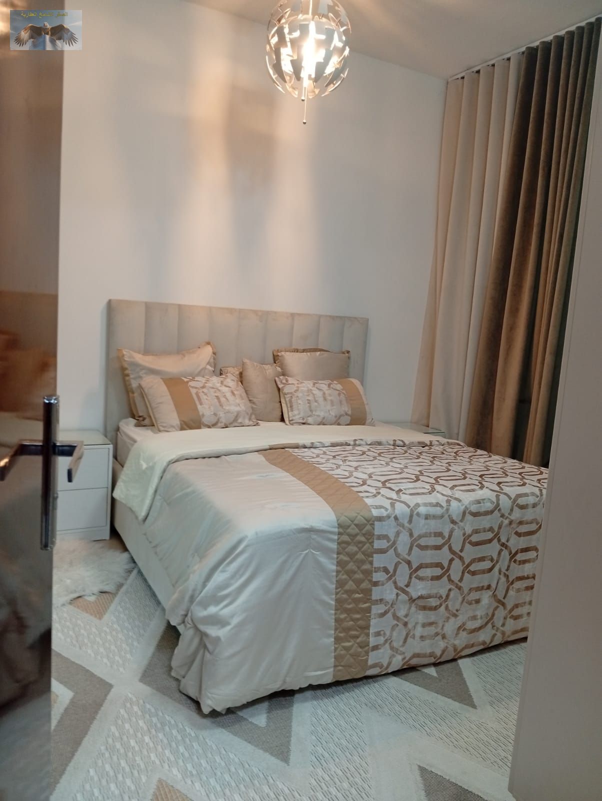 Furnished two-bedroom apartment with a living room available for annual rent in City Towers, Khalifa Street.