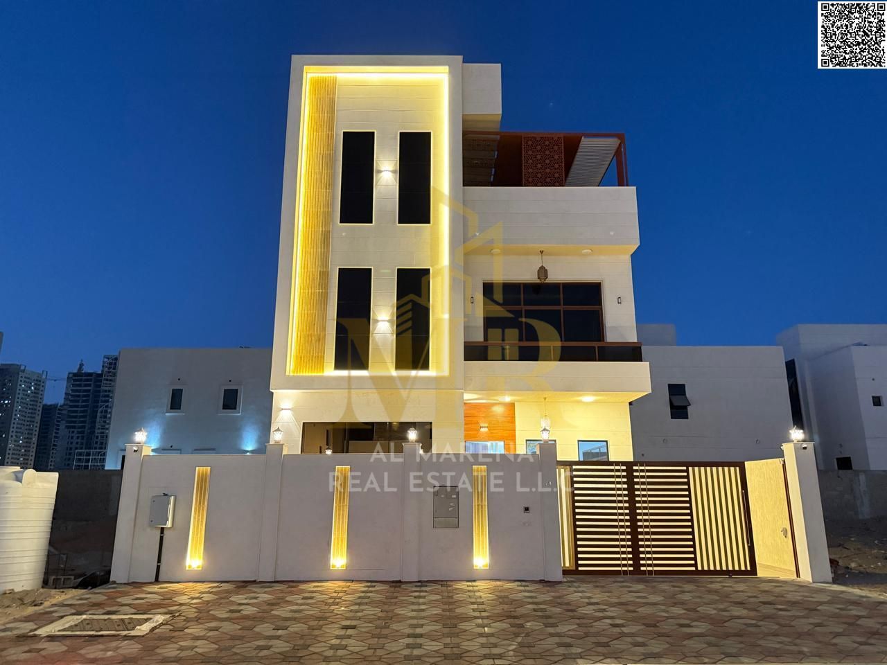 Two-story villa with a rooftop terrace and swimming pool for sale in Al-Amirah area. The price includes electricity, water, and air conditioning. The