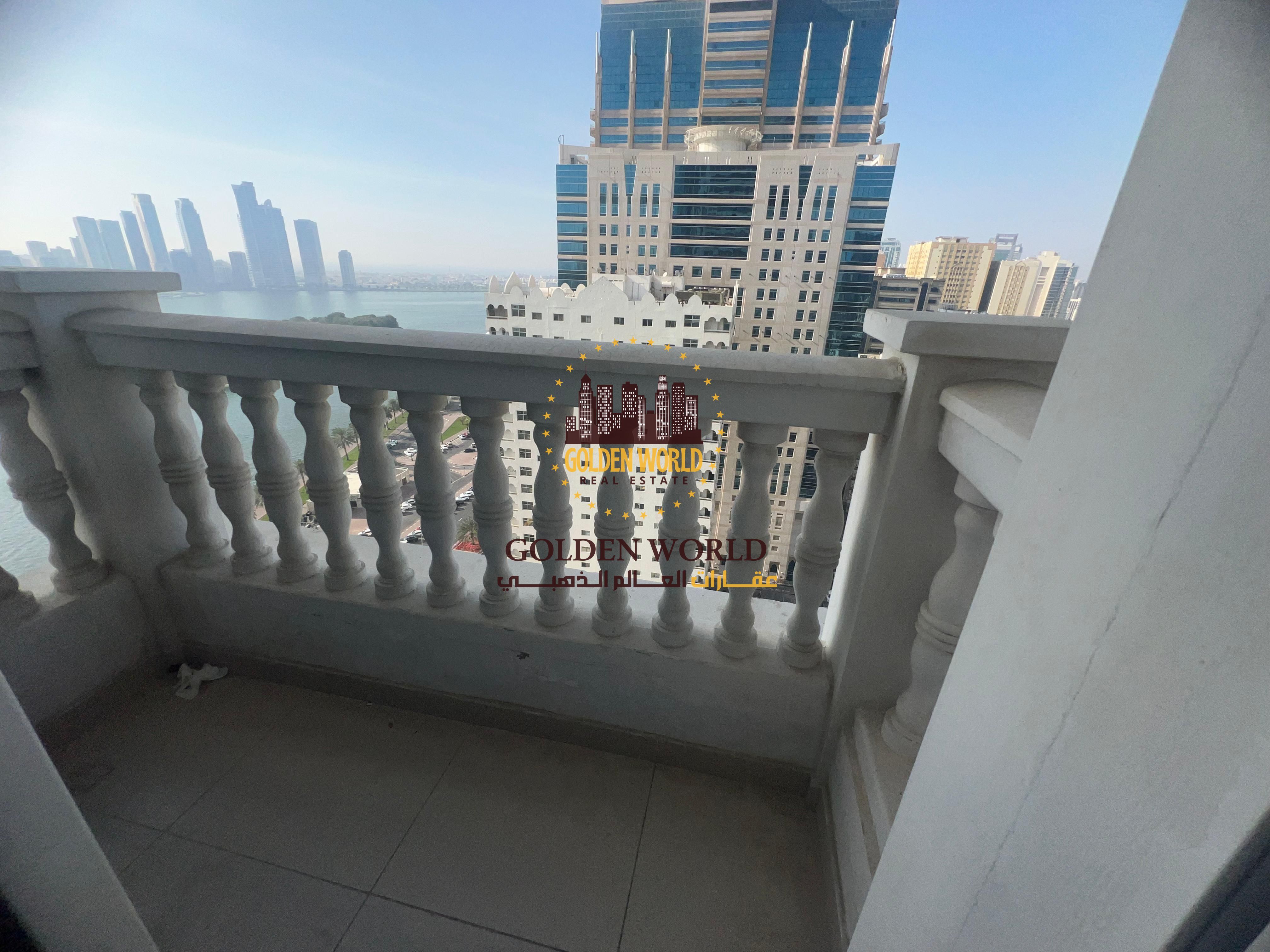 Al Majaz 1 | 2BR hall, parking, free AC, balcony in bedroom, master room, 3 baths, sea view, gym & pool. 70K.