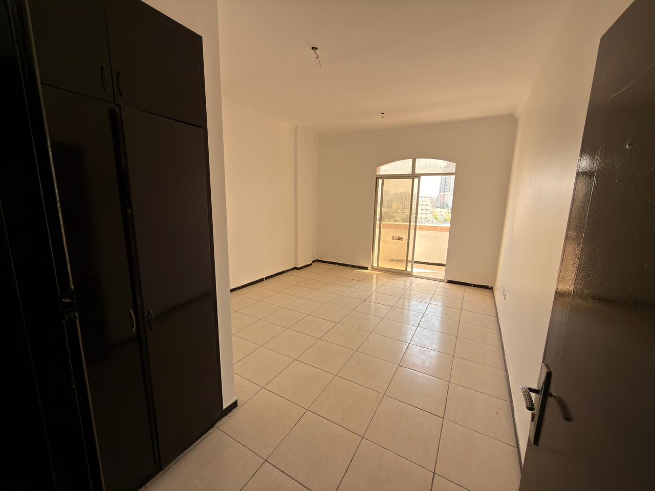 One bedroom and living room apartment for annual rent in Al Rashidiya, Old Traffic Street, near Ajman One and Ajman Corniche, at a special price. Com