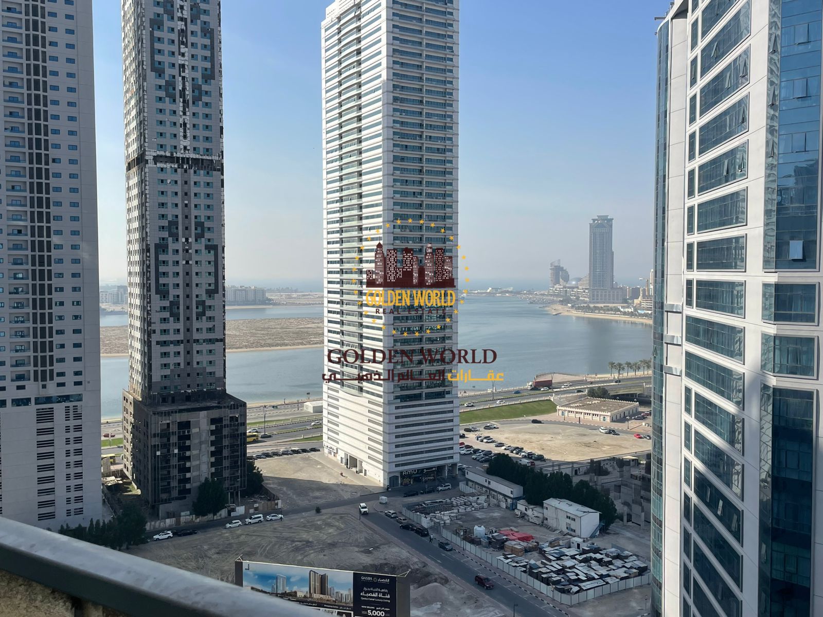 Sea view 2BR between Al Taawun & Al Khan, balcony, laundry room, gym, pool & parking – AED 60K.