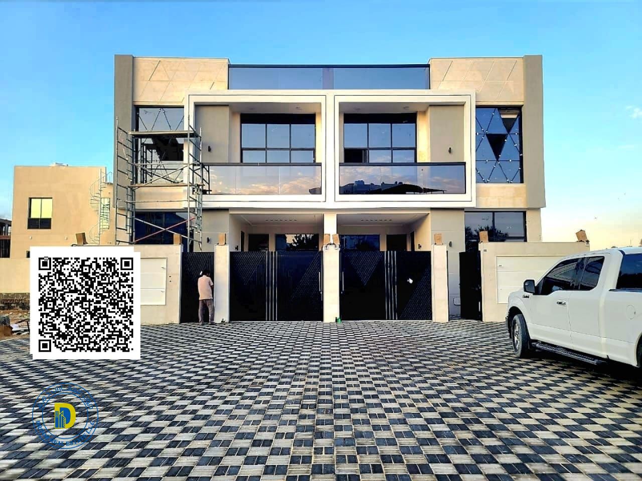In the prestigious Al Helio 2 area of Ajman, a luxurious 5-bedroom villa with a rooftop terrace, including registration fees, at an attractive price