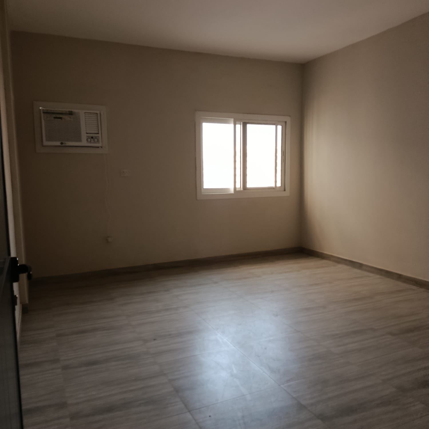 Brand-new 2BR apartment in Al Majaz 2, spacious living area, 2 bathrooms, balcony, first tenant, prime location.