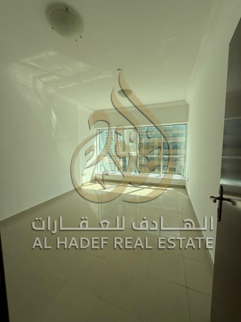 A well-designed apartment featuring 1 bedroom, living room, 2 bathrooms, and built-in wardrobes, located in a strategic area next to Al Baik Restauran