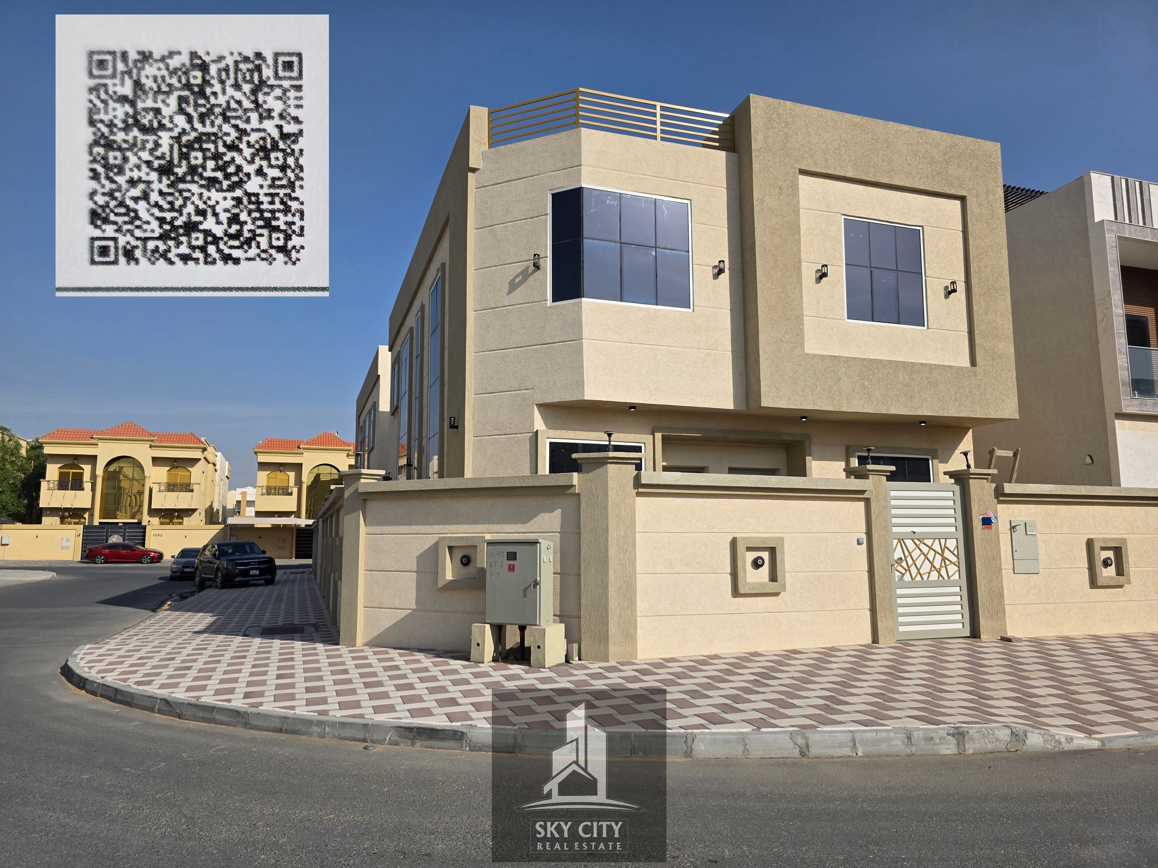 Al Yasmin, opposite Al Rahmaniya and Sharjah Sustainable City, corner villa on two streets, ready to move in, with electricity and water. Brand new, first occupancy. 5 master bedrooms, majlis, 2 living rooms, and maid's room. Fully serviced area. Freehold